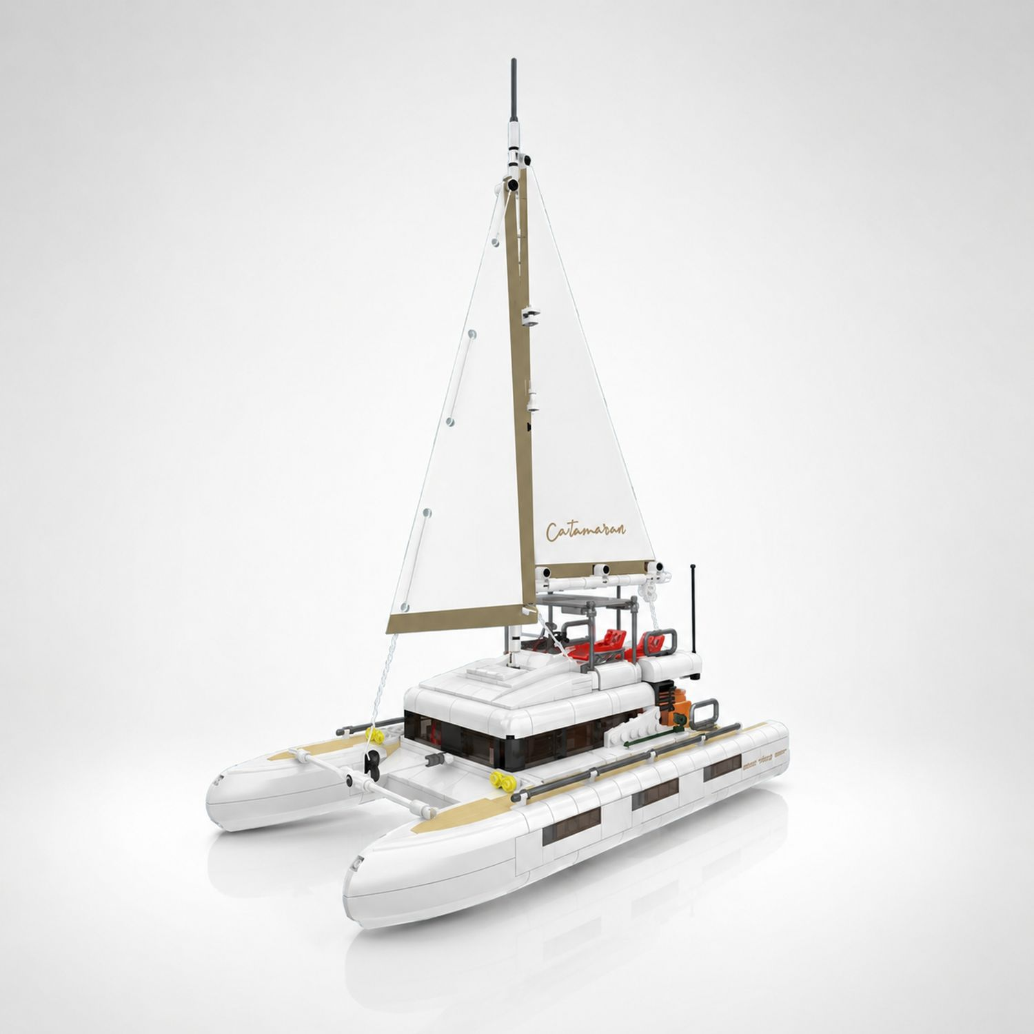 Biały katamaran żaglowy Lego z beżowym żaglem z napisem "Catamaran".