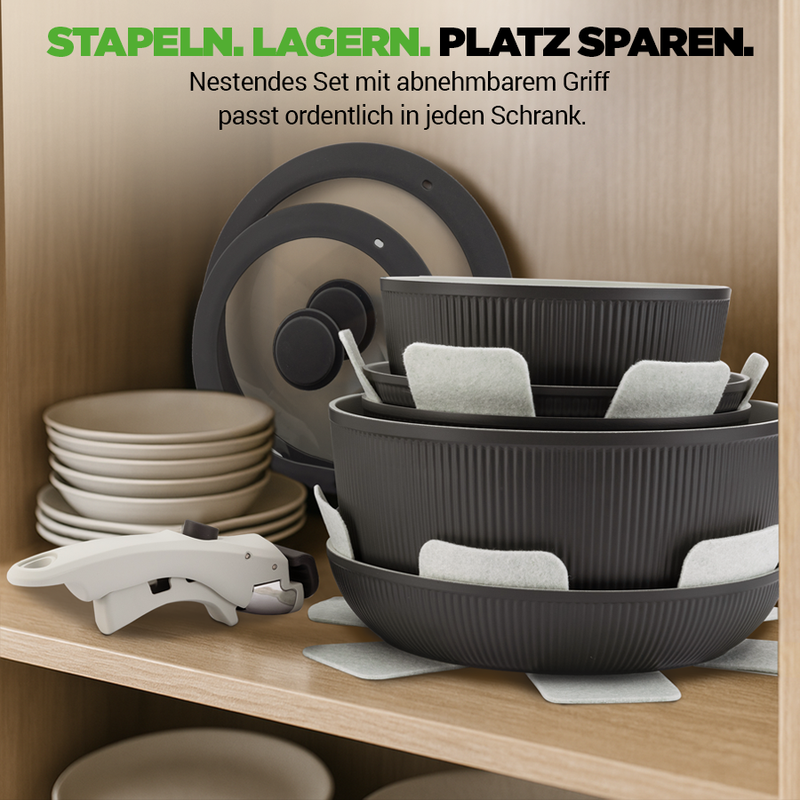 Stapelbare Schüsseln und Teller mit Deckel und weißem Griffwerkzeug im Schrank.