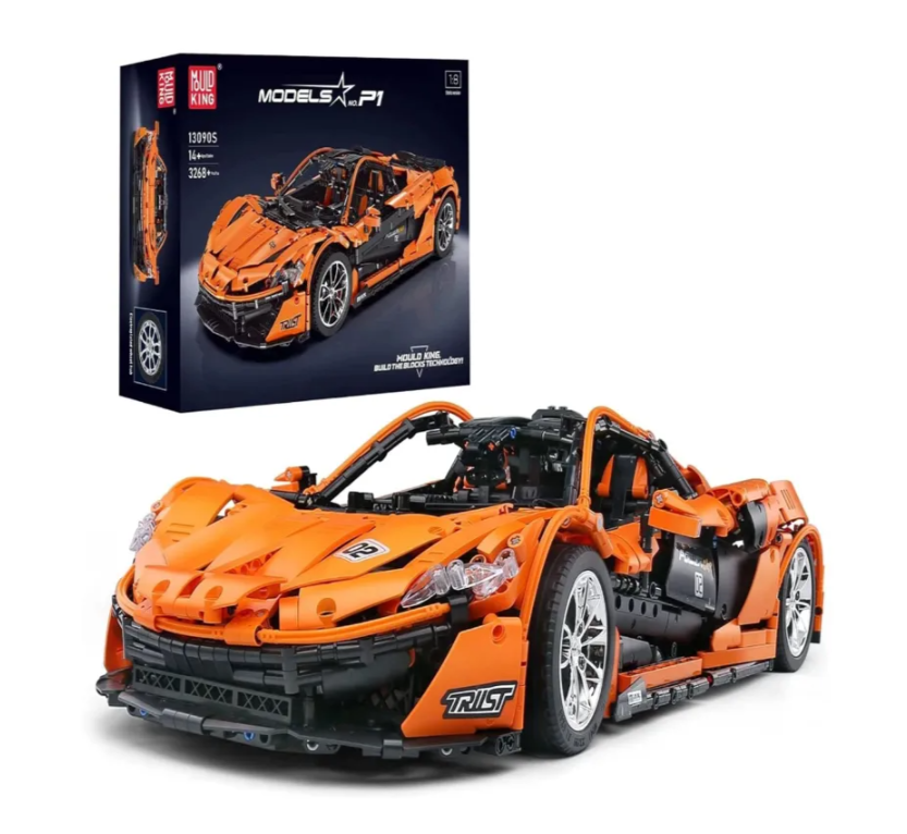 Pomarańczowy model samochodu sportowego Lego z opakowaniem obok.