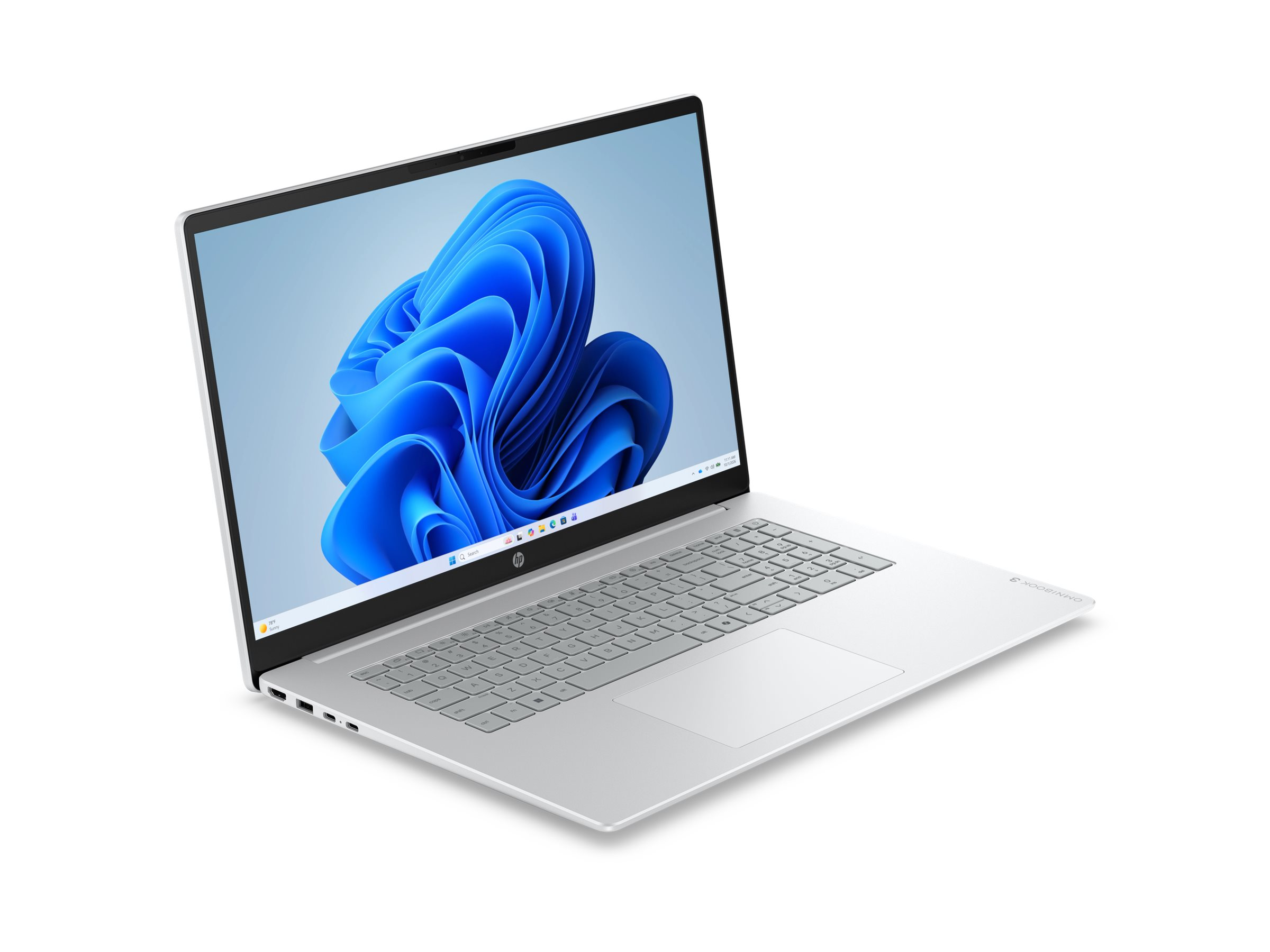 Ein silberner Laptop mit einem blauen Hintergrund auf dem Bildschirm.