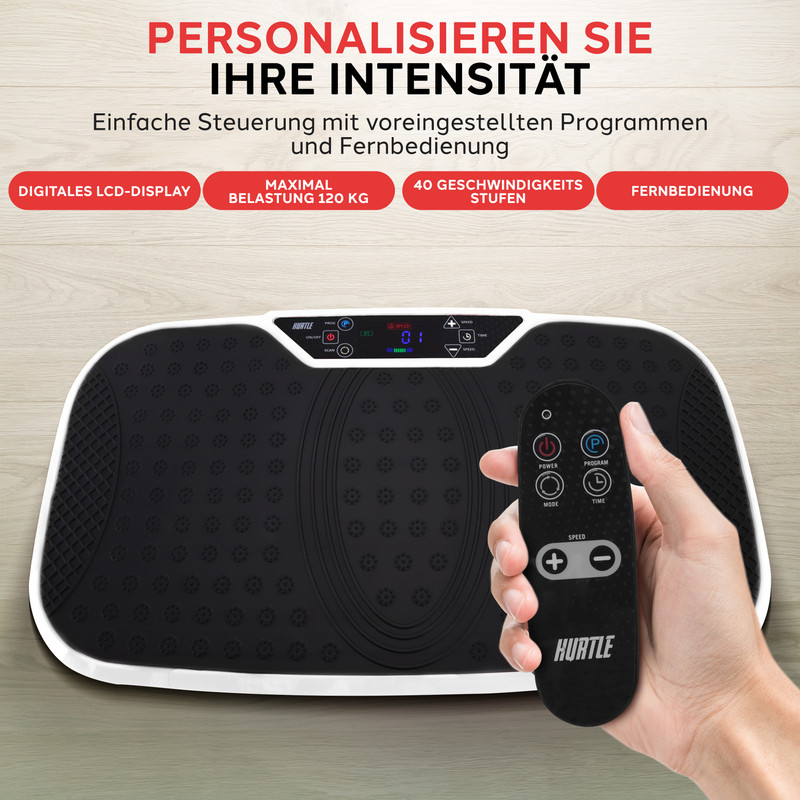 Schwarzes Vibrationsgerät mit Fernbedienung, das von einer Hand gehalten wird.