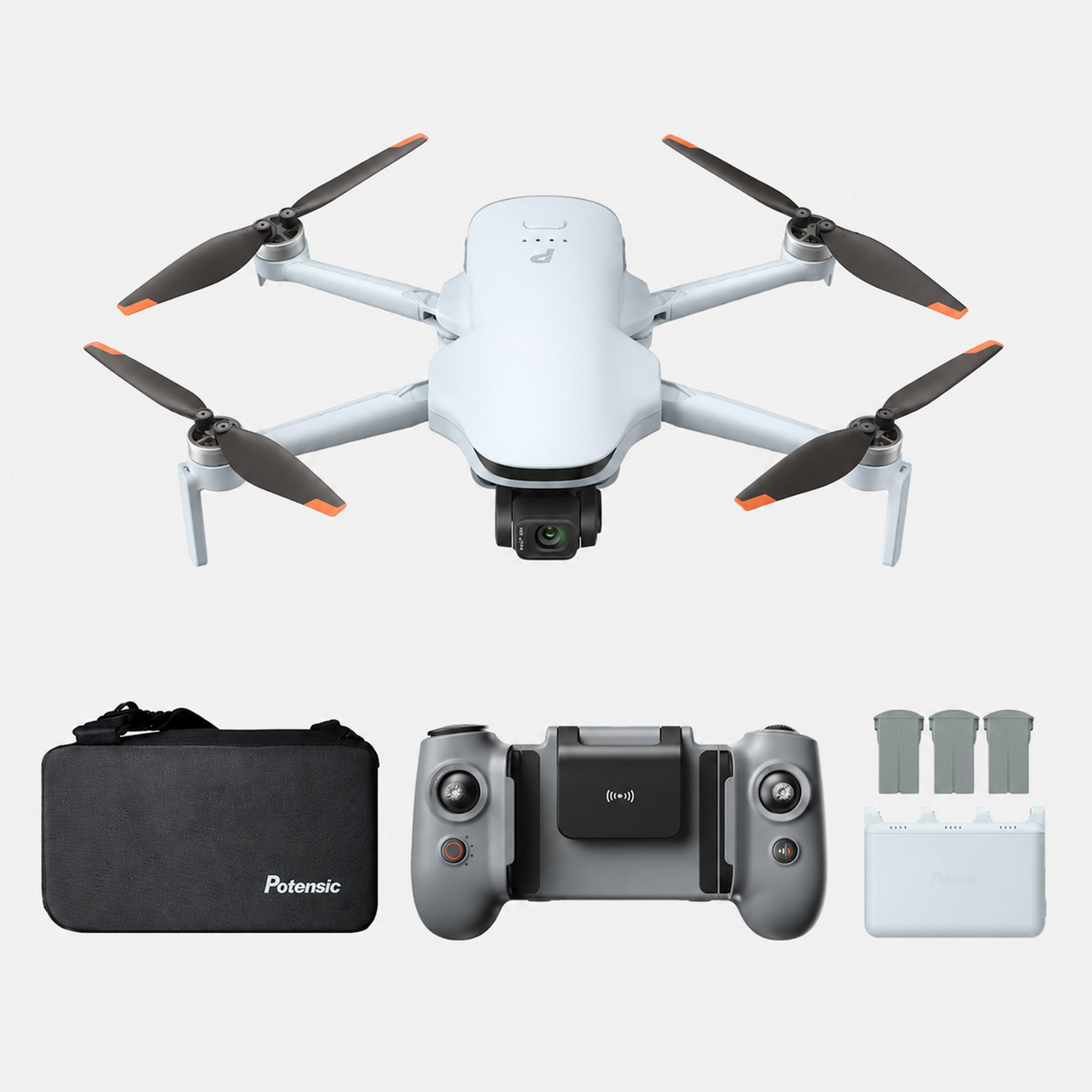 Biały dron z czarnymi śmigłami, szary kontroler, czarne etui, baterie.