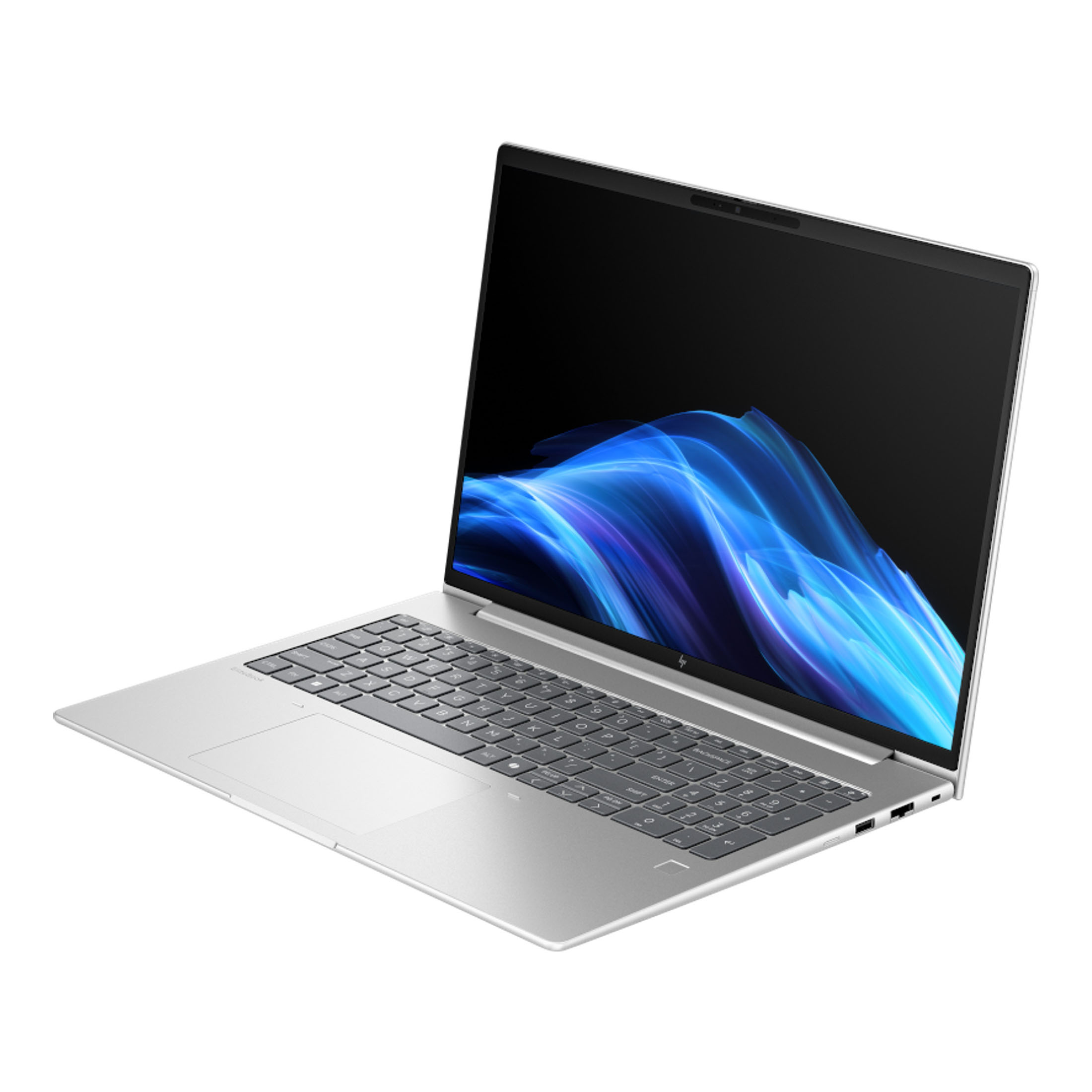 Ein silberner Laptop mit einem dunklen Bildschirm, auf dem blaue und weiße Wellen zu sehen sind.
