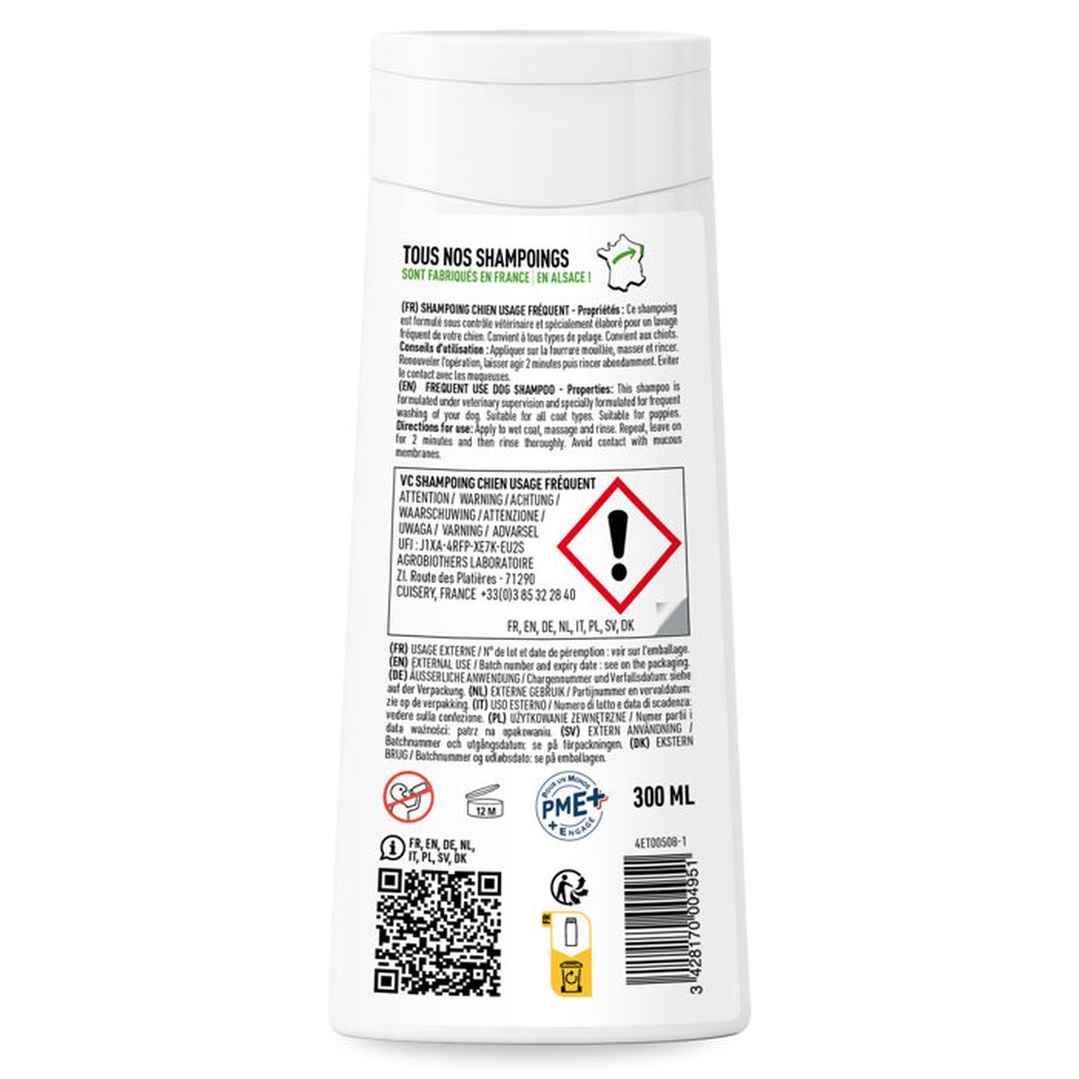 Flasche Hundeshampoo mit Warnsymbol und Produktinformationen.