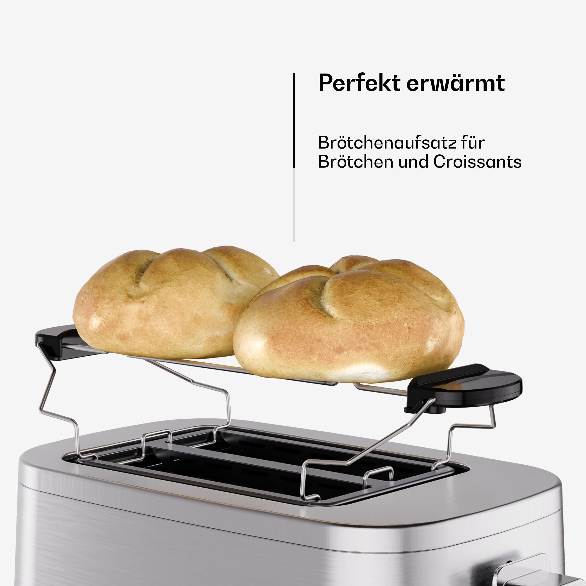 Zwei Brötchen auf einem silbernen Toaster-Ständer. Perfekt erwärmt.