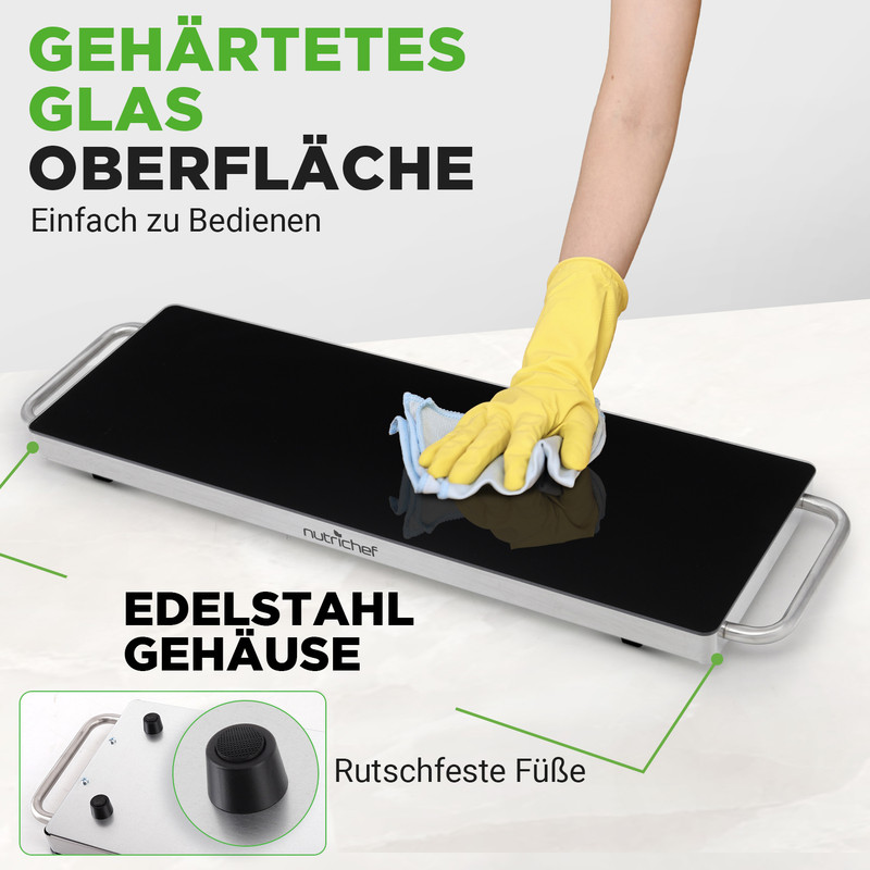 Eine gelbe Hand wischt mit einem blauen Tuch über eine schwarze Glasoberfläche. Edelstahlgehäuse.