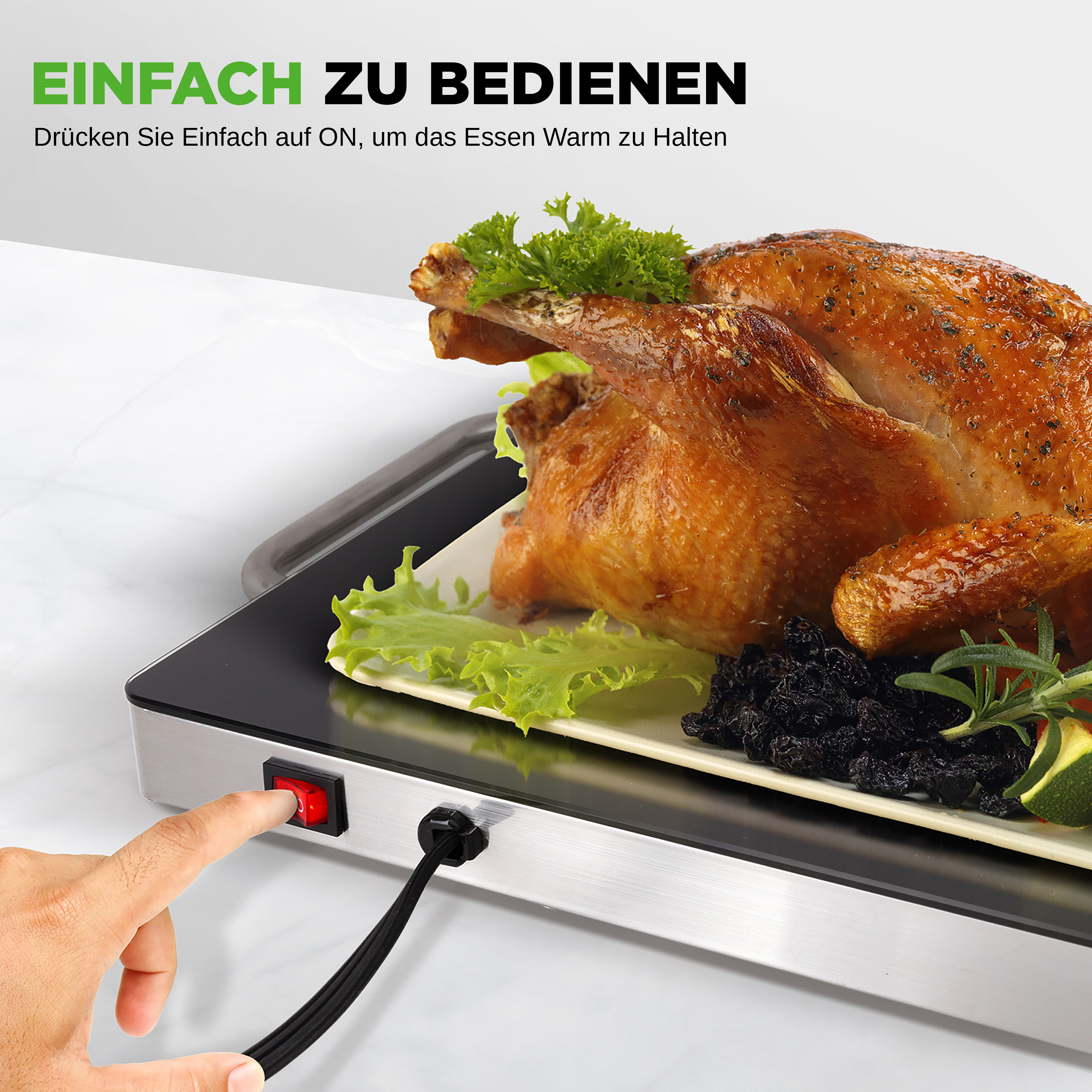 Ein Mensch drückt einen roten Schalter an einem Kochgerät, das einen Braten serviert.
