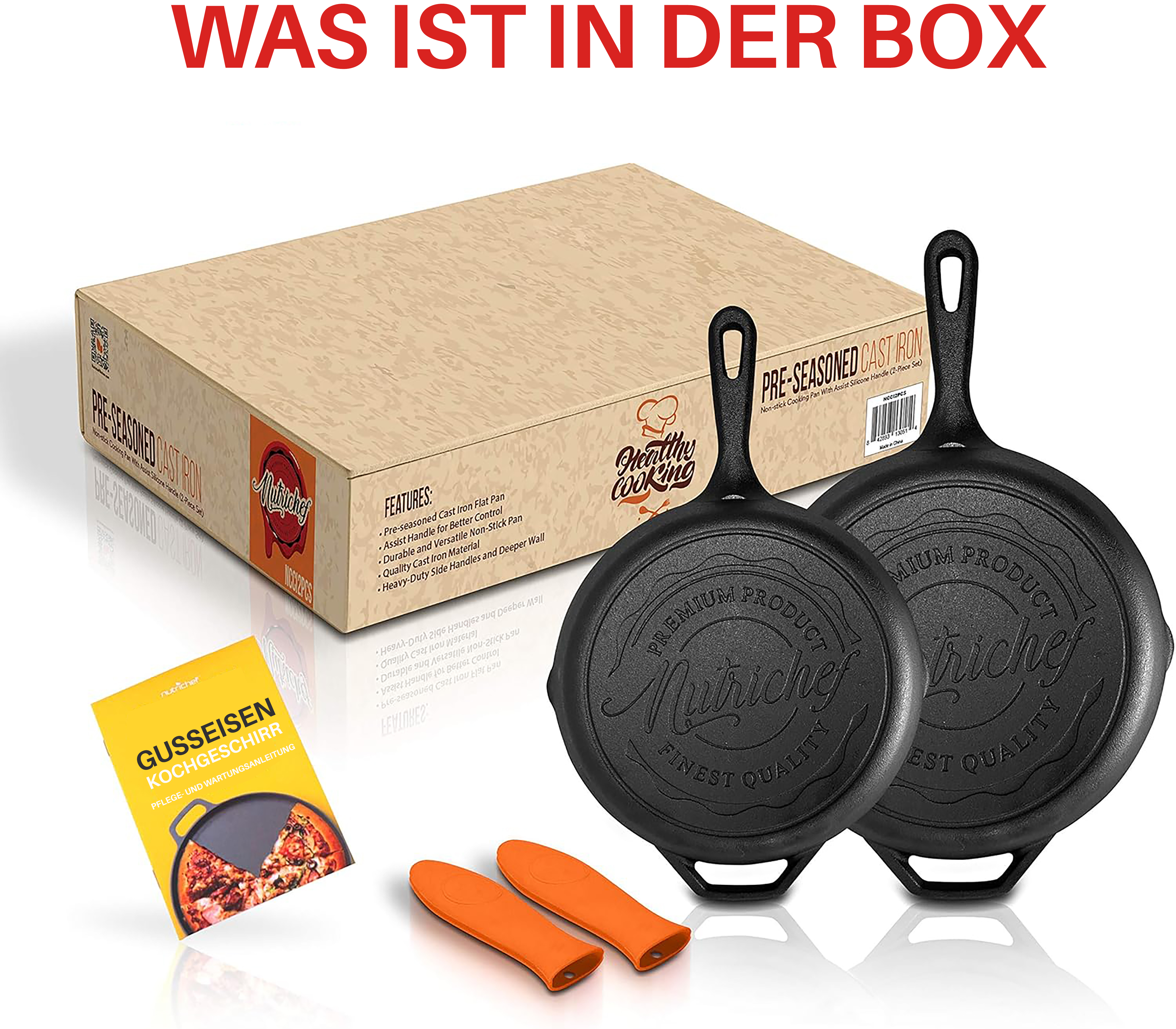 Karton mit zwei Gusseisenpfannen, orangen Griffschonern und einem Rezeptheft.
