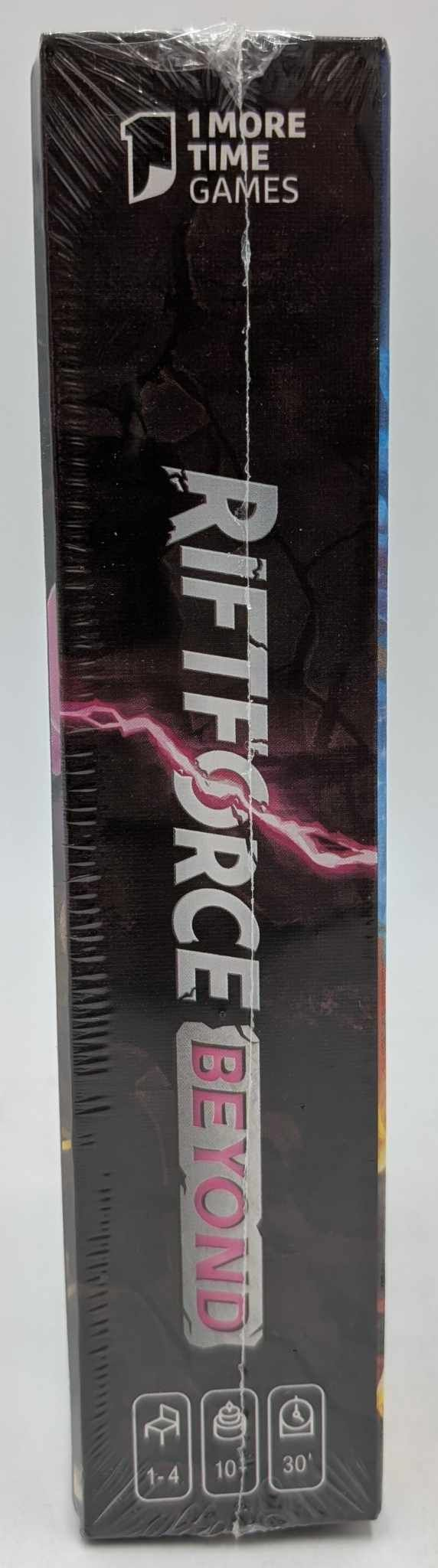 Brettspielverpackung mit Schriftzug "RIF FORCE BEYOND" und "1 MORE TIME GAMES".