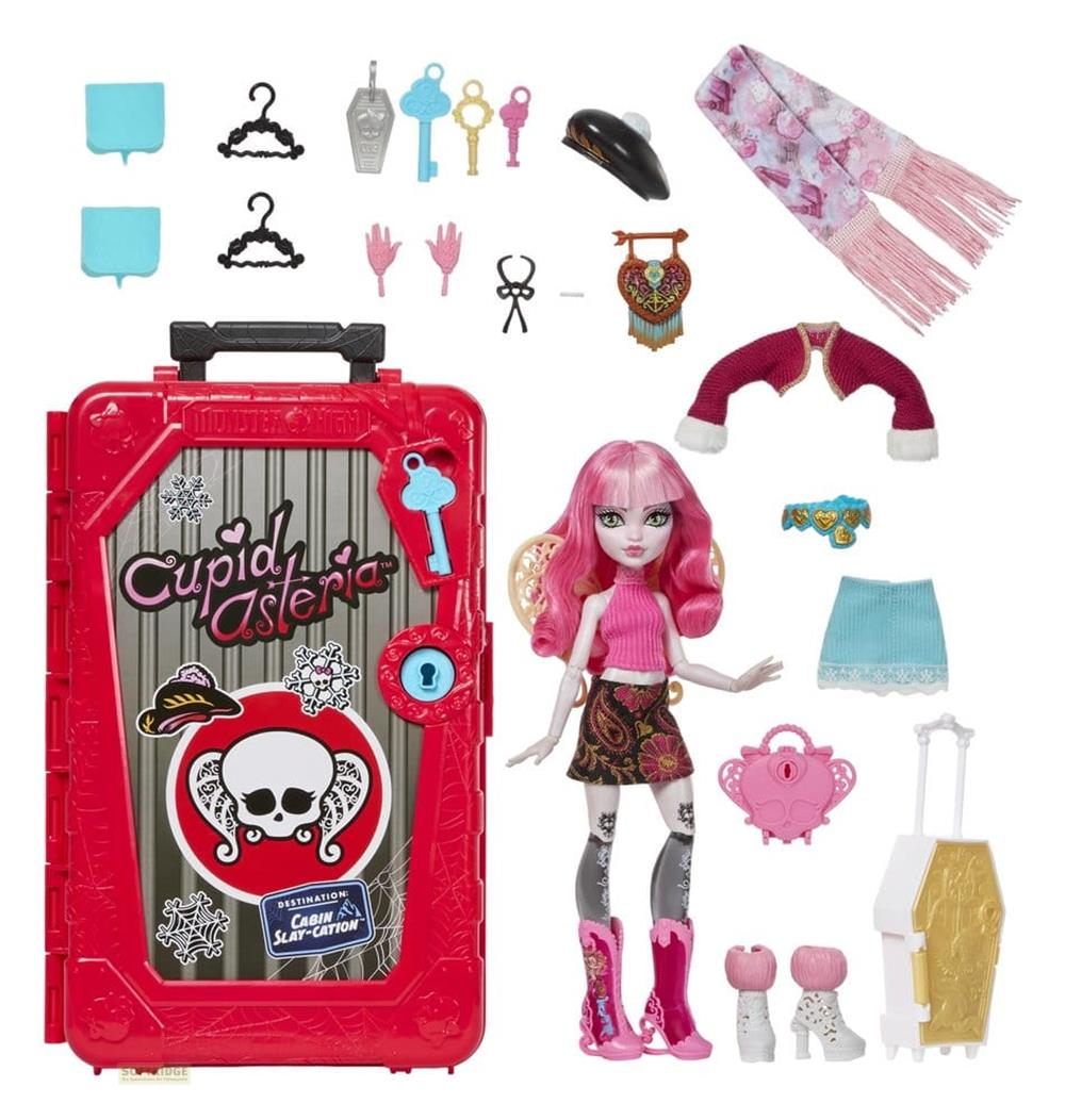Muñeca Monster High con accesorios: maleta, ropa, bufanda y más.