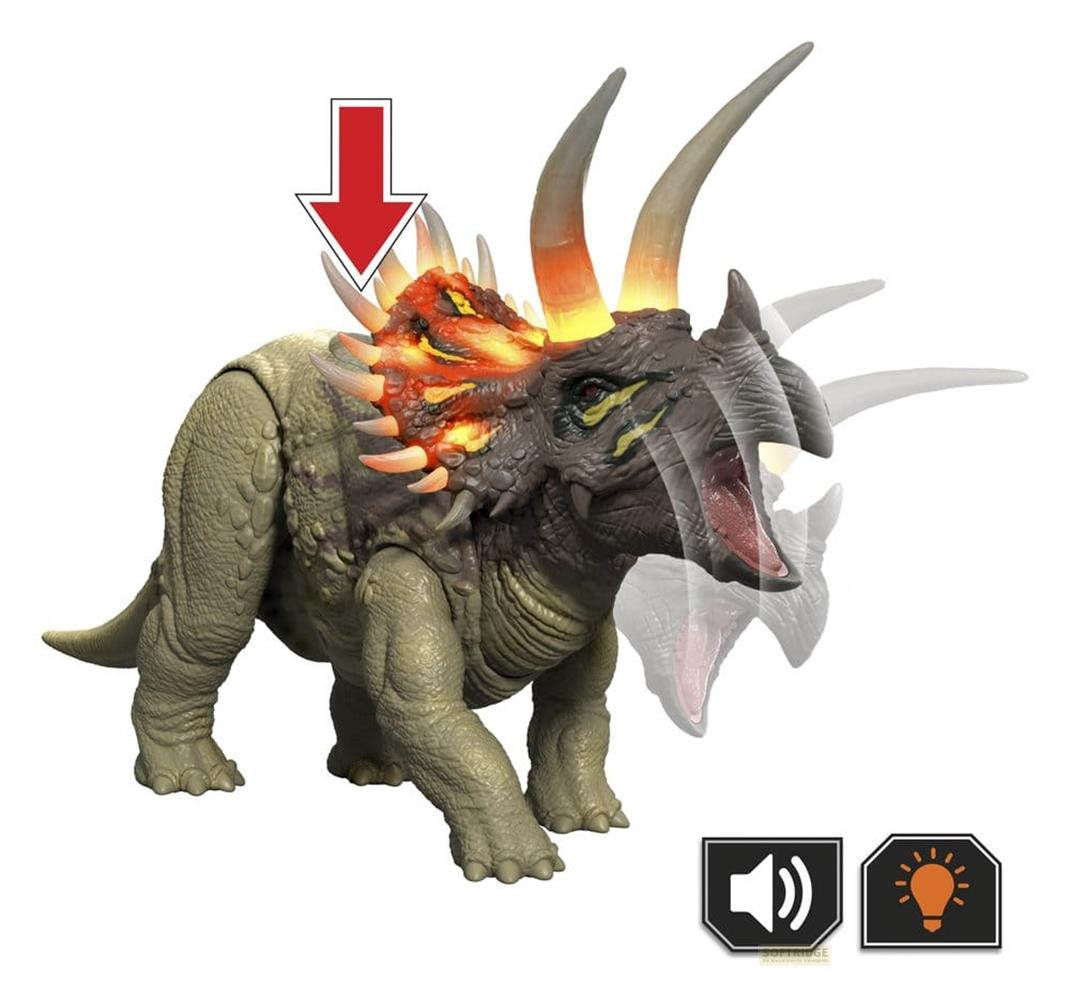 Un Triceratops de juguete verde con cuernos brillantes y una flecha roja.
