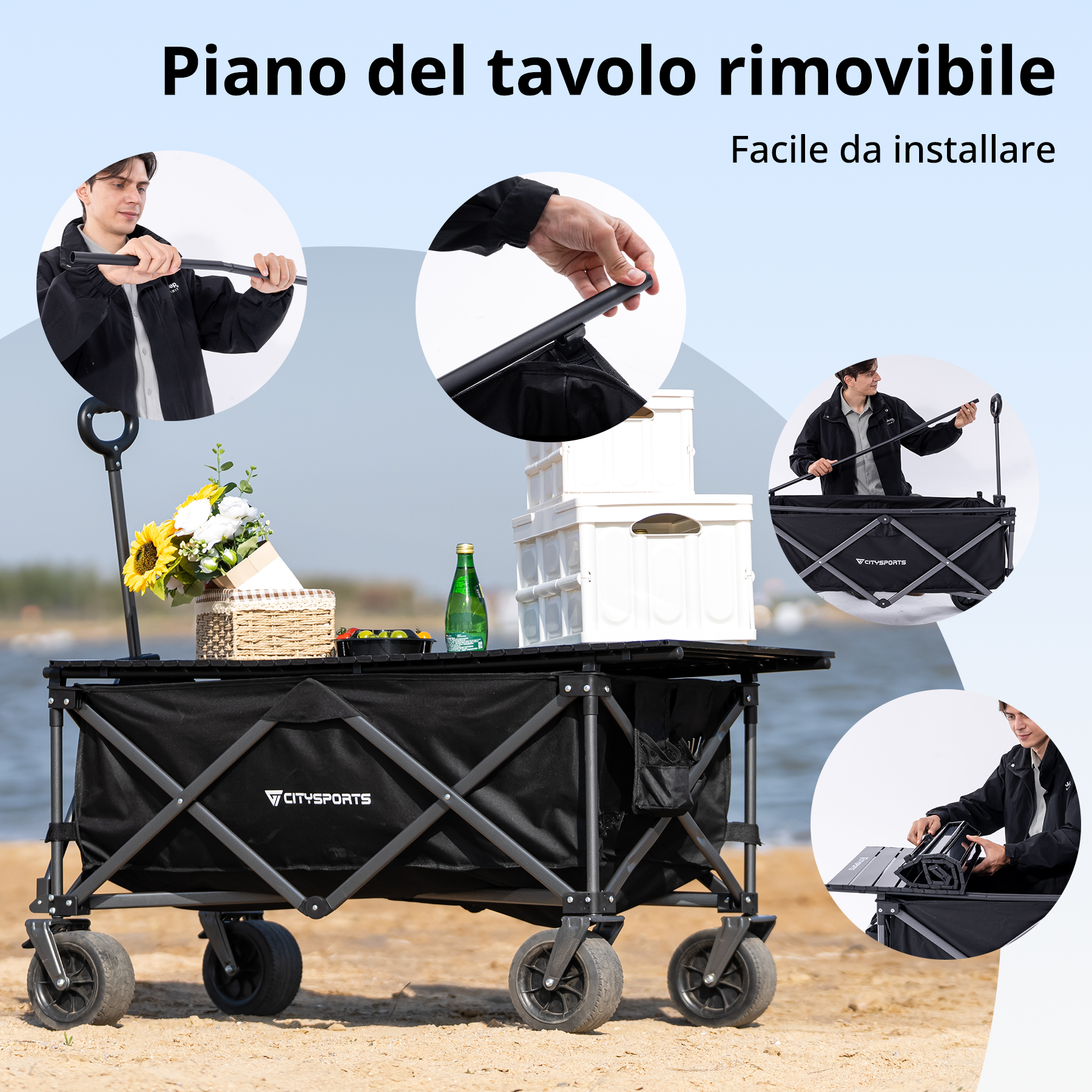 Un uomo monta un carrello pieghevole nero con piano d'appoggio sulla spiaggia.