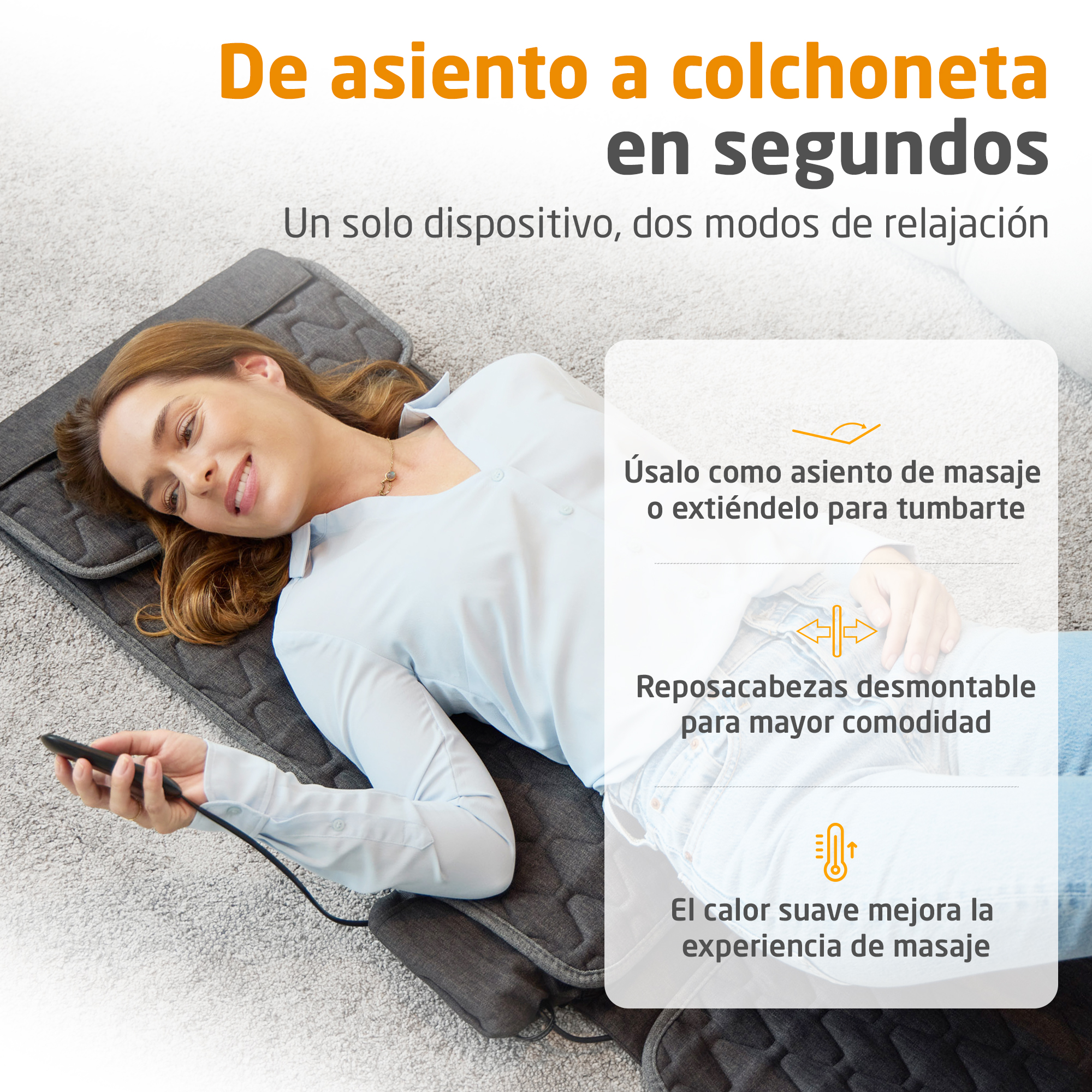Una mujer yace en una alfombra de masaje, sosteniendo un mando.