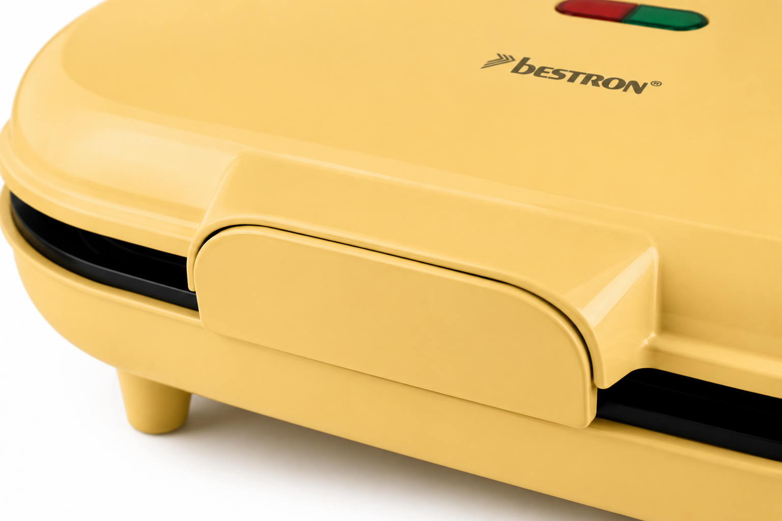 Waffle maker giallo con logo Bestron e spie rosse/verdi.