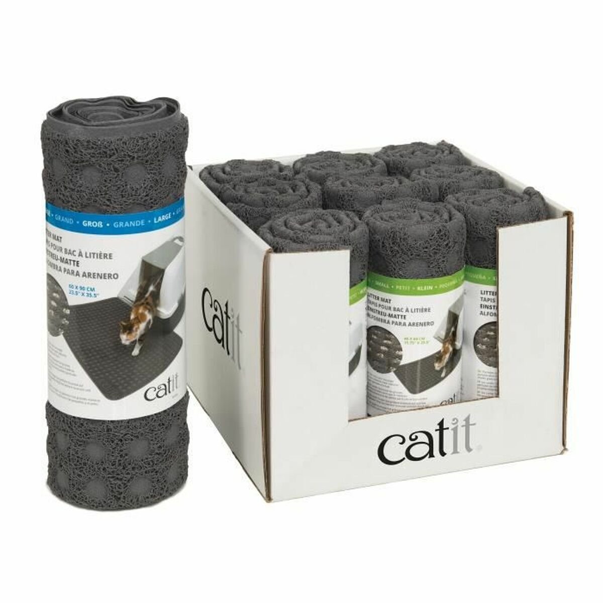 Graue Katzenklo-Matten in einer Box und eine gerollte Matte.