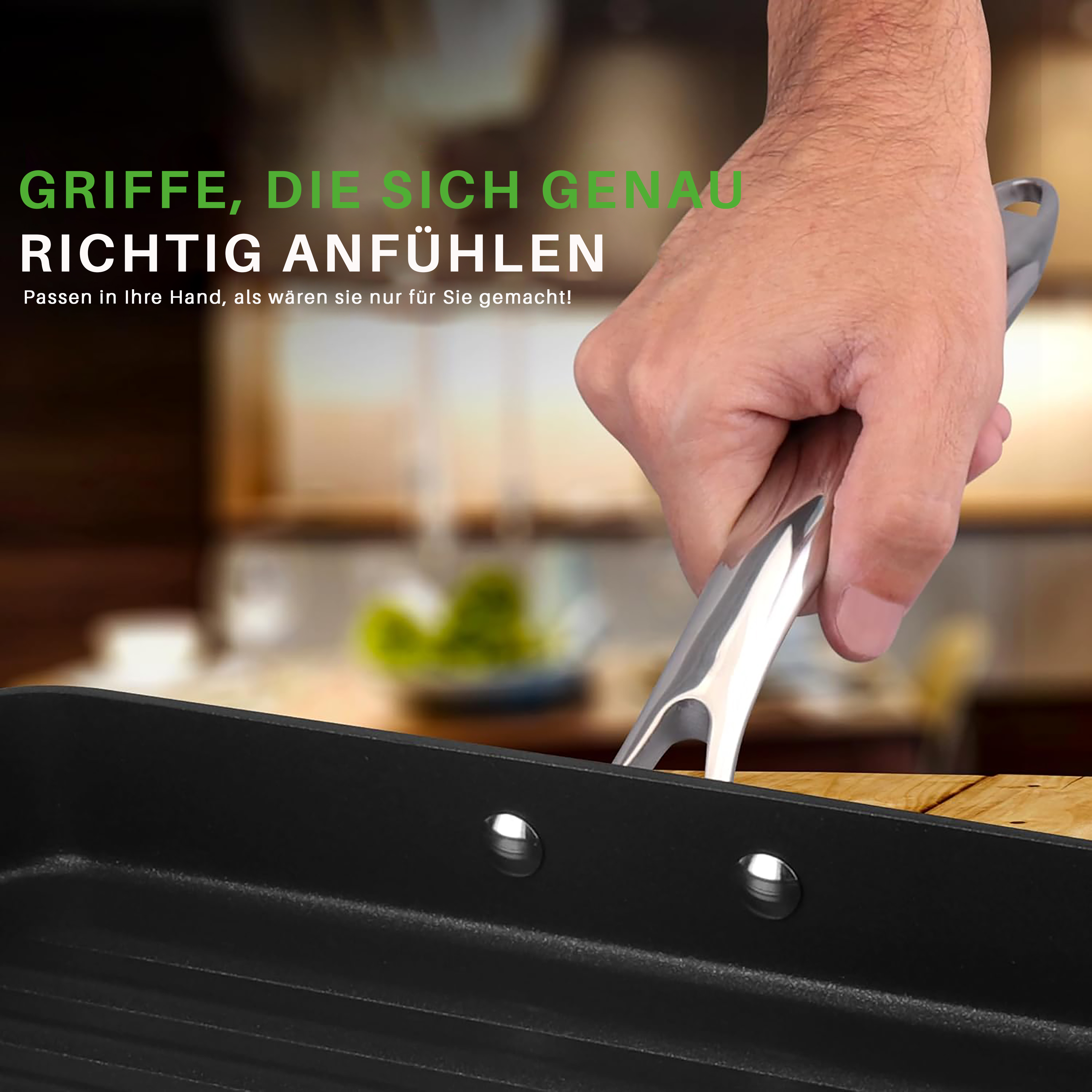 Hand greift den metallenen Griff einer Bratpfanne in einer Küche.