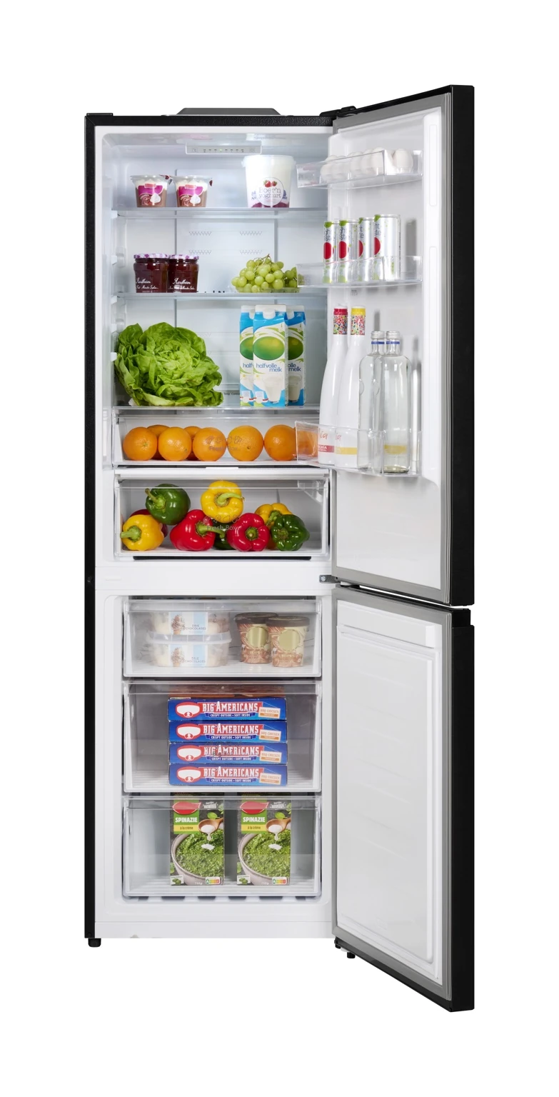 Open black refrigerator filled with food. Joghurt, jam, fruit, vegetables, drinks.