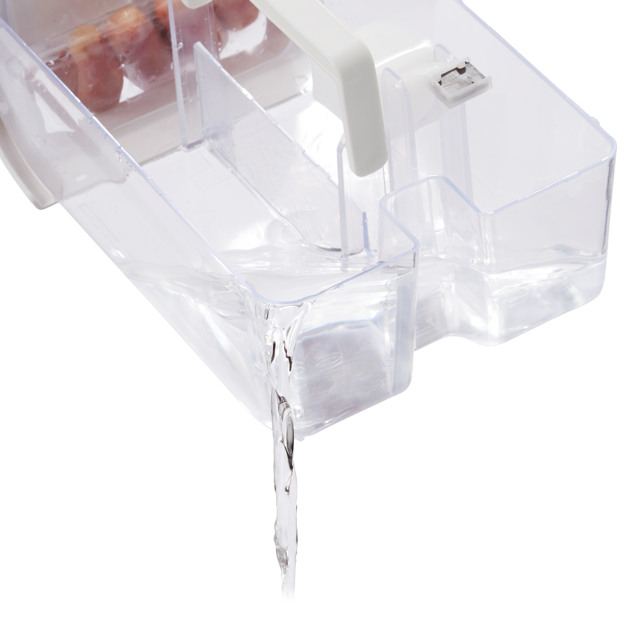 A clear container with a handle, water being poured into it.