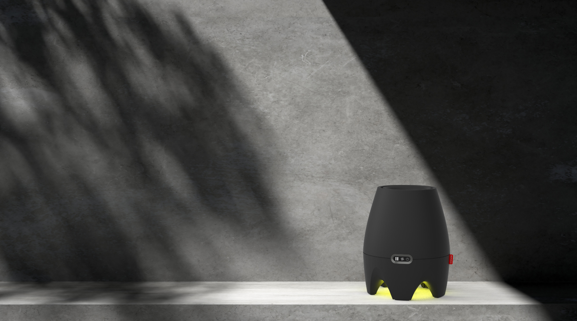 A black speaker with yellow accents sits on a shelf against a concrete wall.