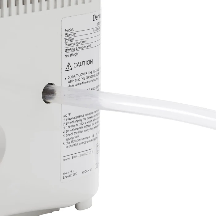 A white appliance with a white tube extending from its side.