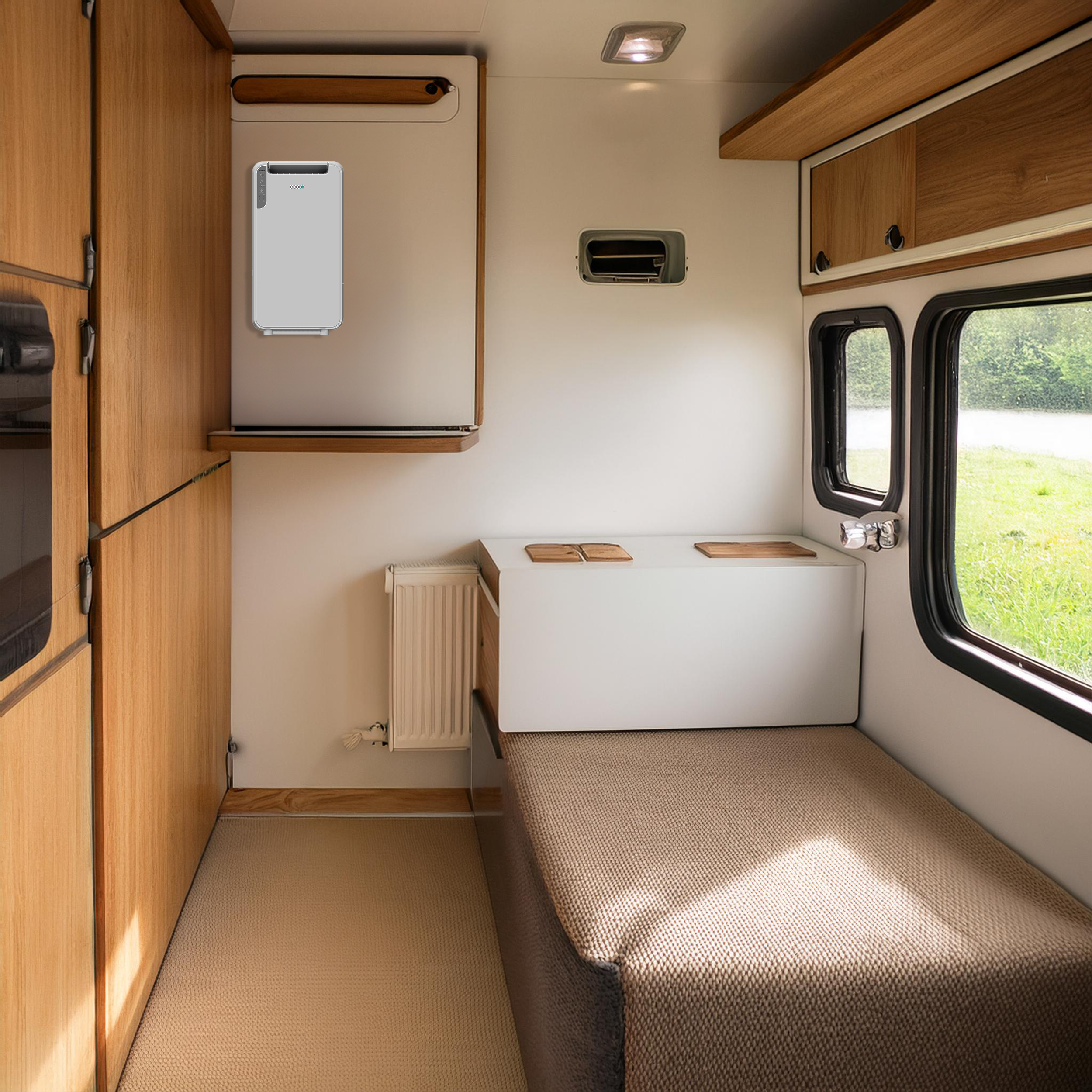 Interior of a camper van with wood paneling, bed, radiator, and window.