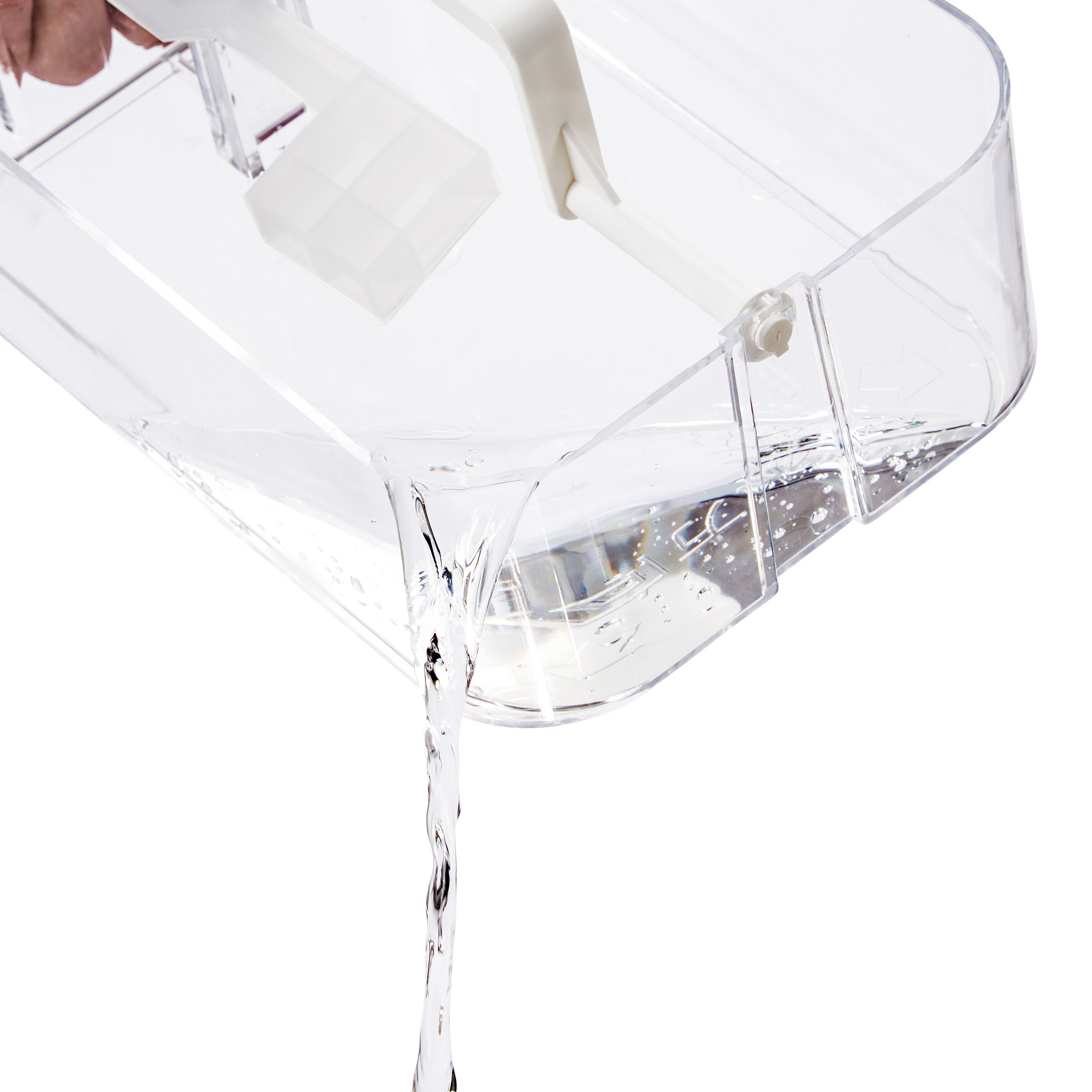 Clear container with water pouring out and a white handle.