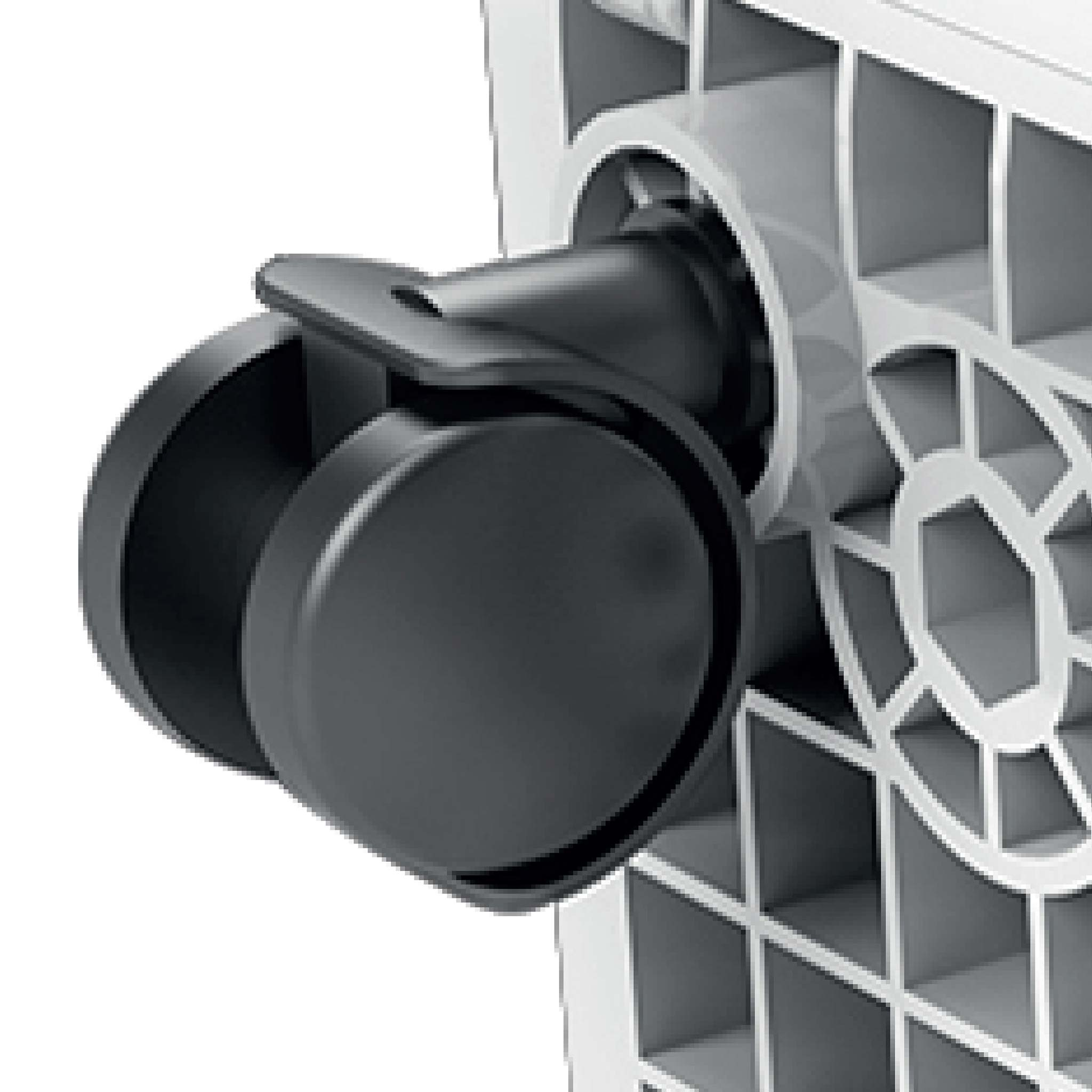 Close-up of a black double wheel attached to a white plastic housing.