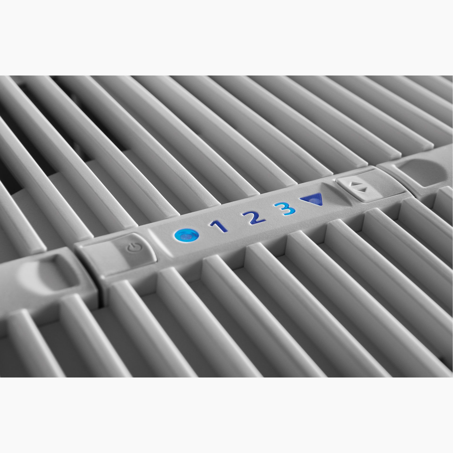 Gray slats with blue lights and symbols for on/off, 1, 2, 3, and up/down.