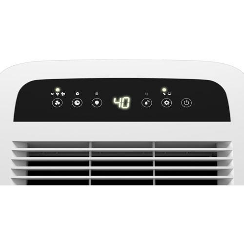 A white dehumidifier with a digital display and air vents.