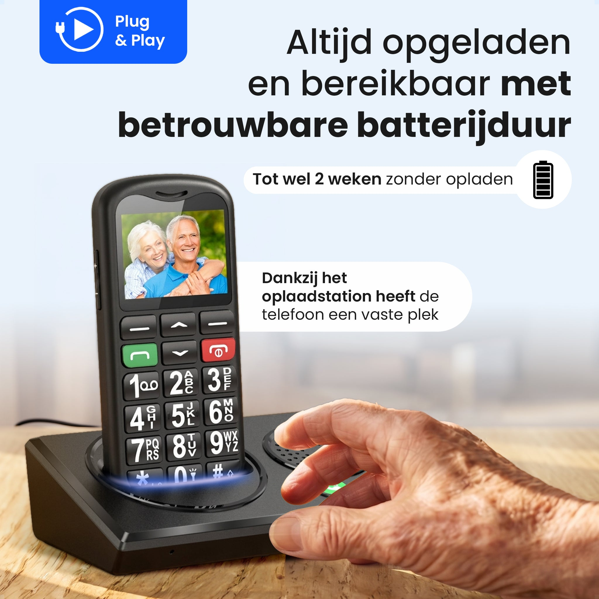 Un téléphone senior avec grand écran et boutons sur une station de charge.