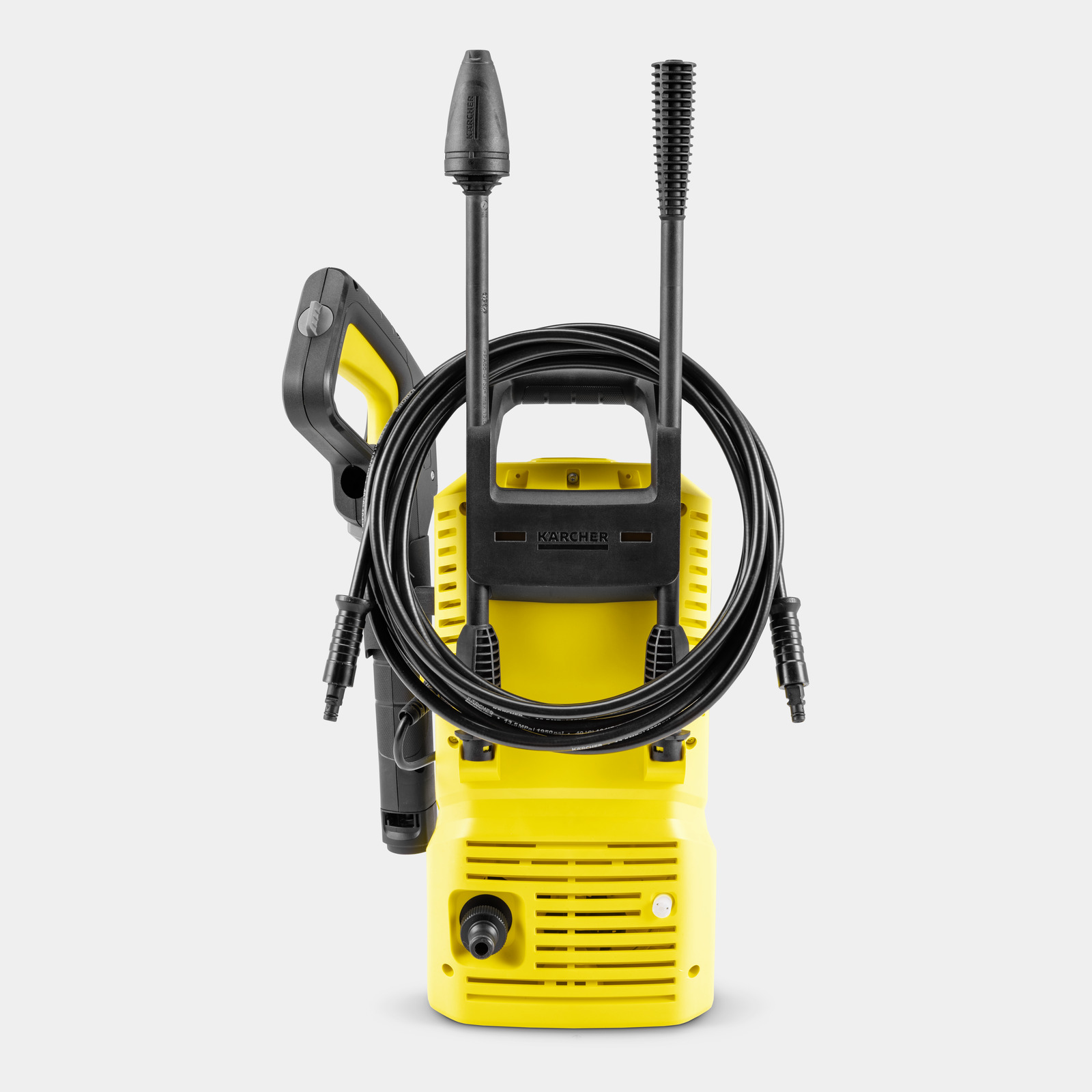 Idropulitrice gialla con tubo e manico neri. Accessori attaccati. Logo Karcher visibile.