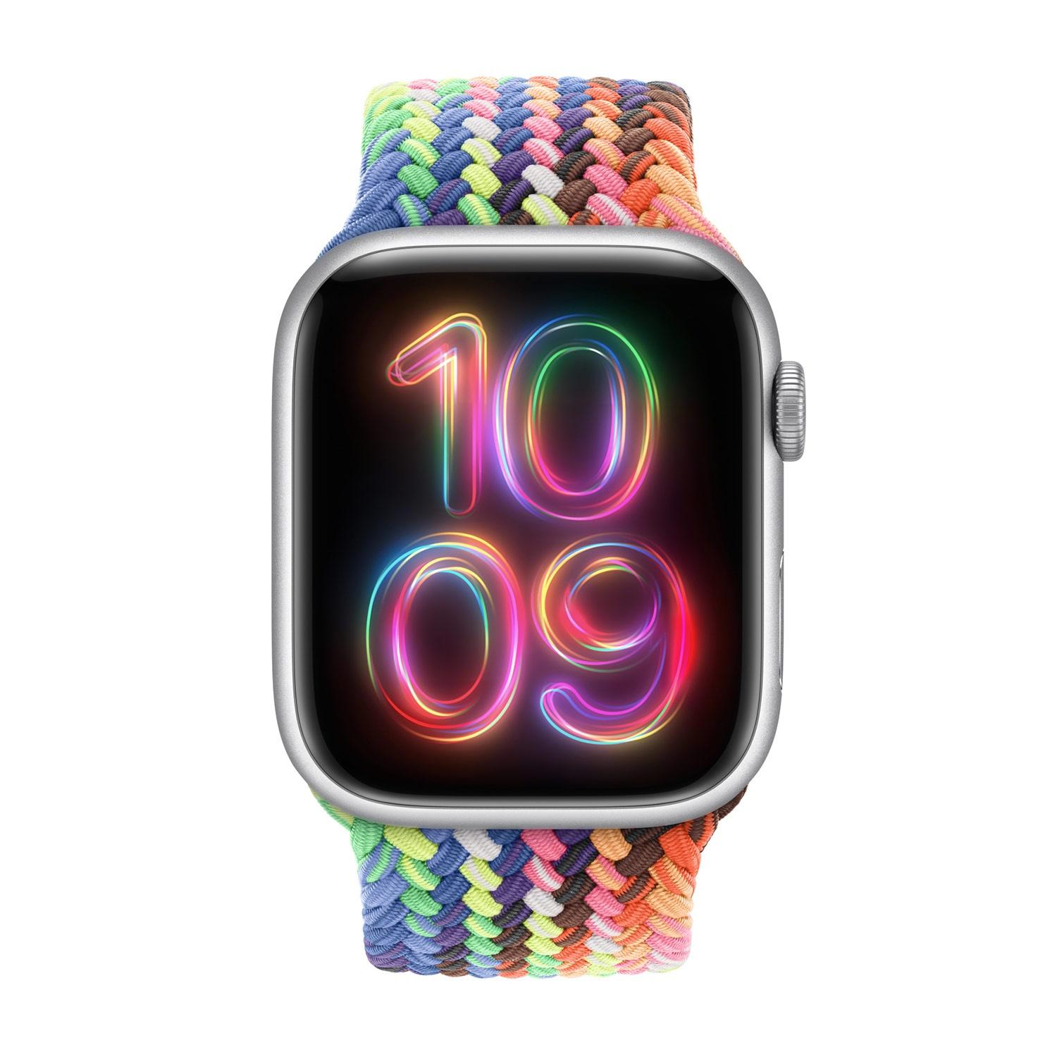 Un orologio con cinturino colorato mostra le 10:09. Lo schermo brilla.