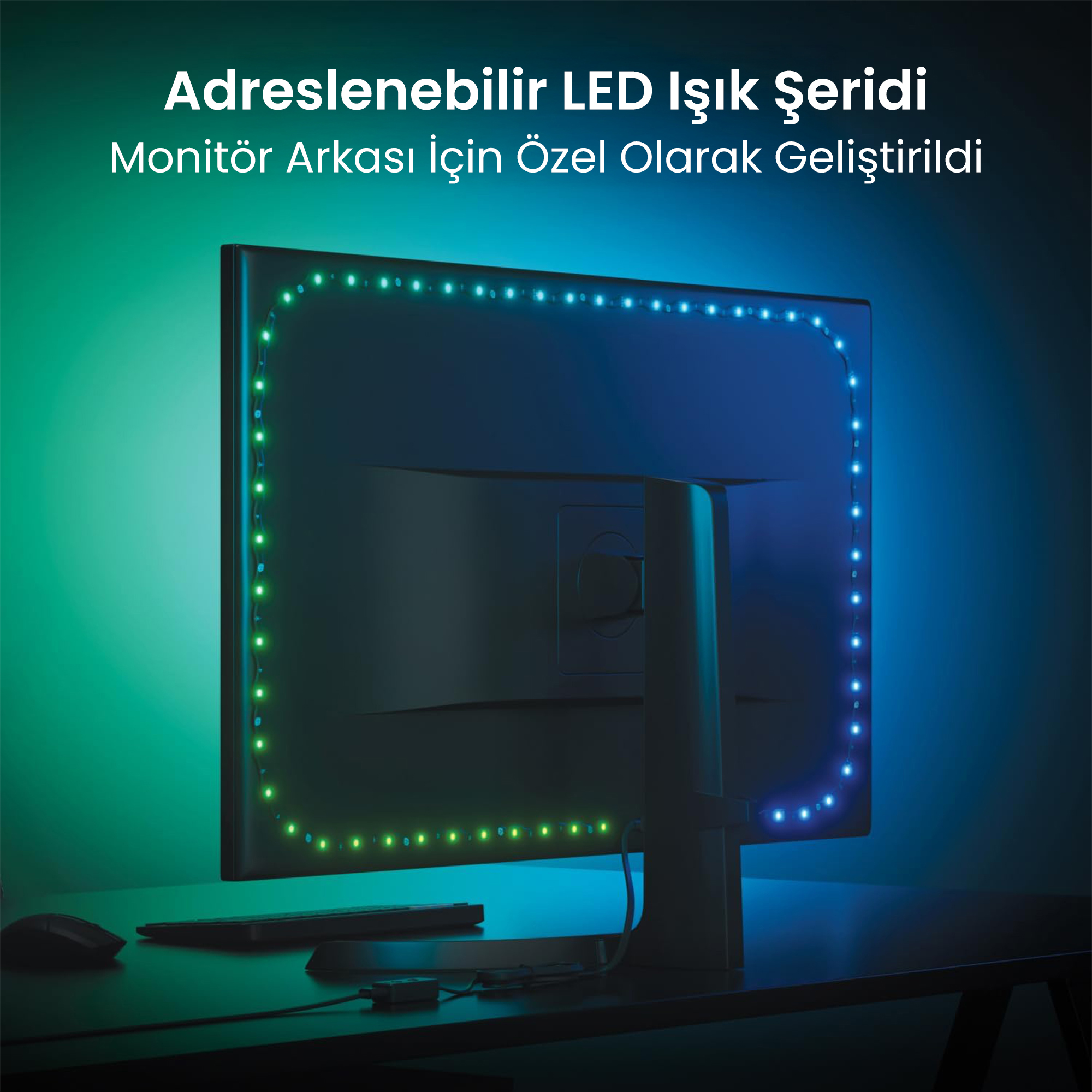 Kenarında mavi ve yeşil parlayan LED ışık şeridine sahip bir monitör.
