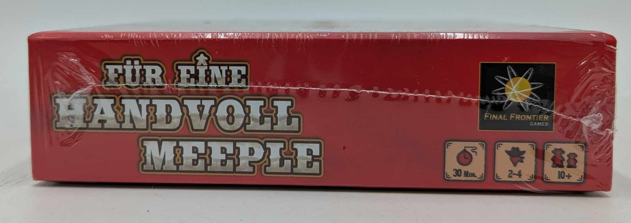 Rote Spieleschachtel mit Aufdruck 'FÜR EINE HANDVOLL MEEPLE' und Spielinfos.