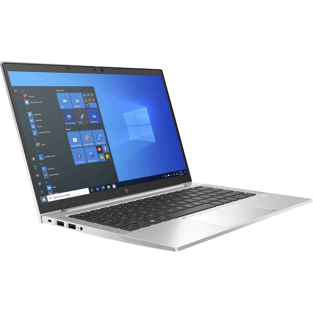 Ein silberner Laptop mit einem geöffneten Windows-Bildschirm und einer Tastatur.
