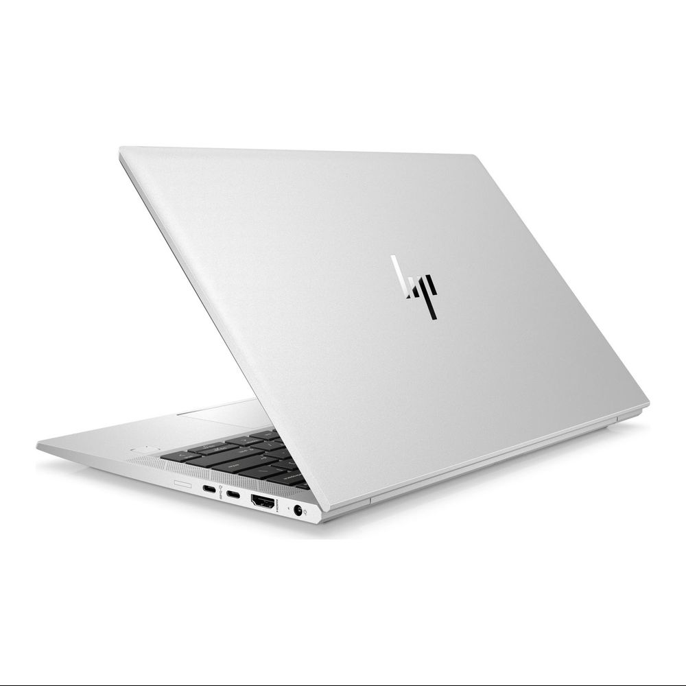 Ein silberner HP Laptop ist geöffnet und zeigt die Tastatur und Anschlüsse.