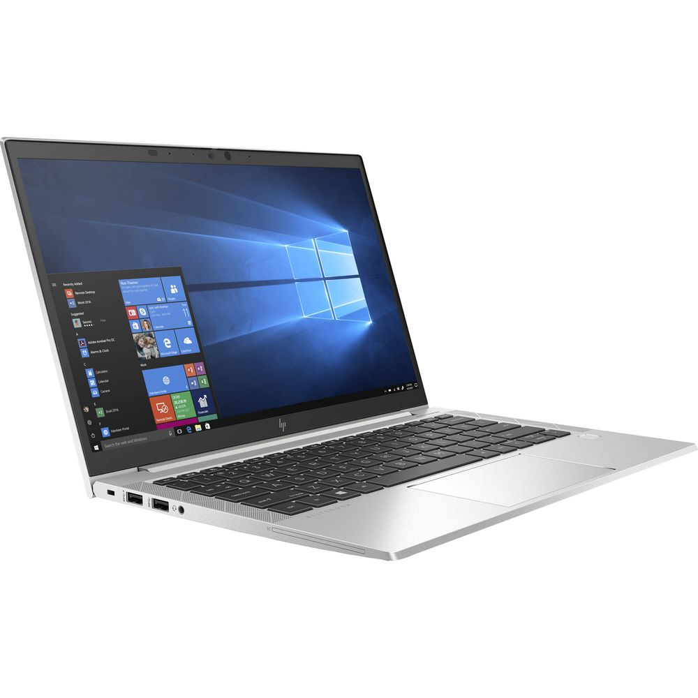 Ein silberner HP Laptop mit geöffnetem Bildschirm, der das Windows-Startmenü und Hintergrundbild anzeigt.