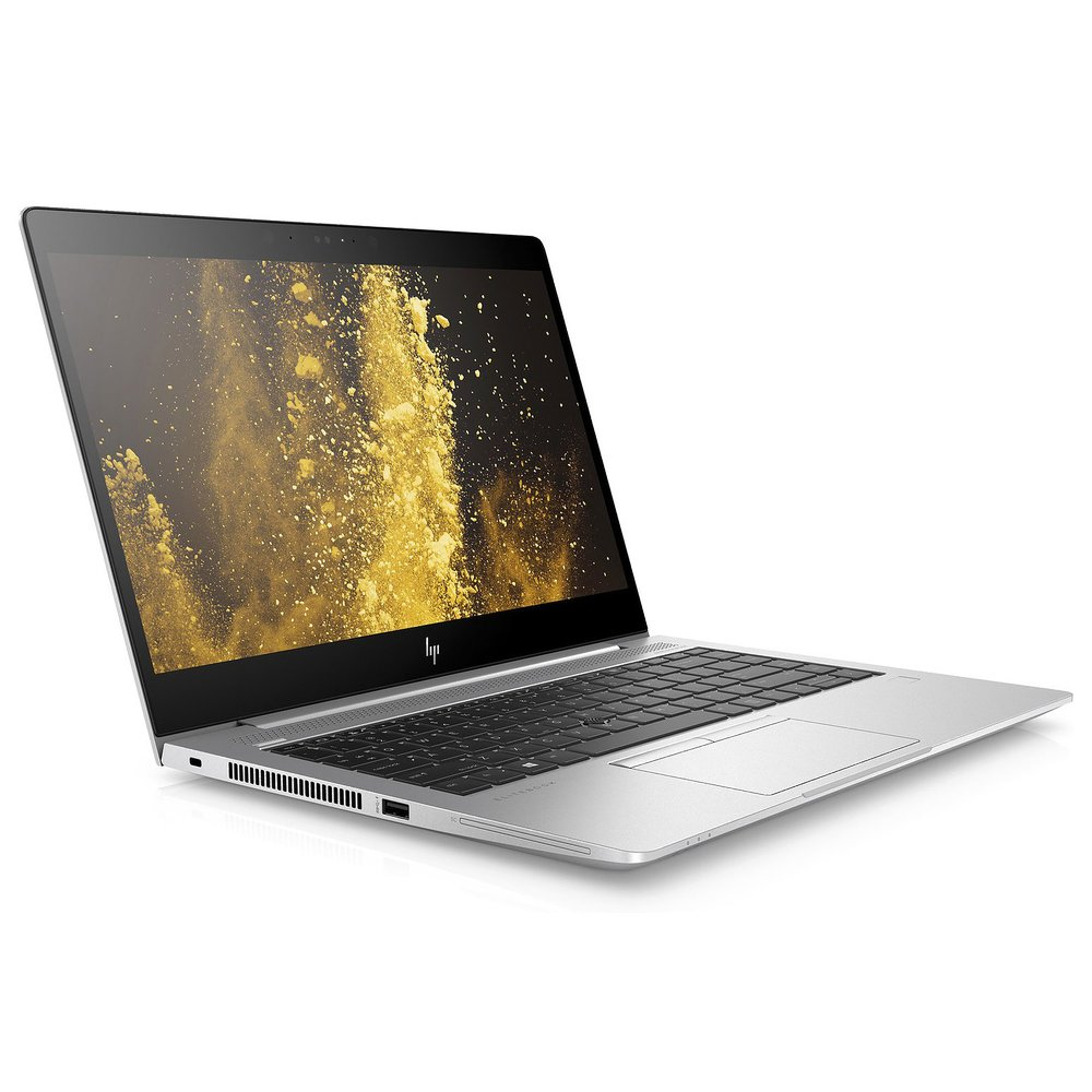 Ein silberner Laptop mit einem goldenen Staub-Hintergrund auf dem Bildschirm.