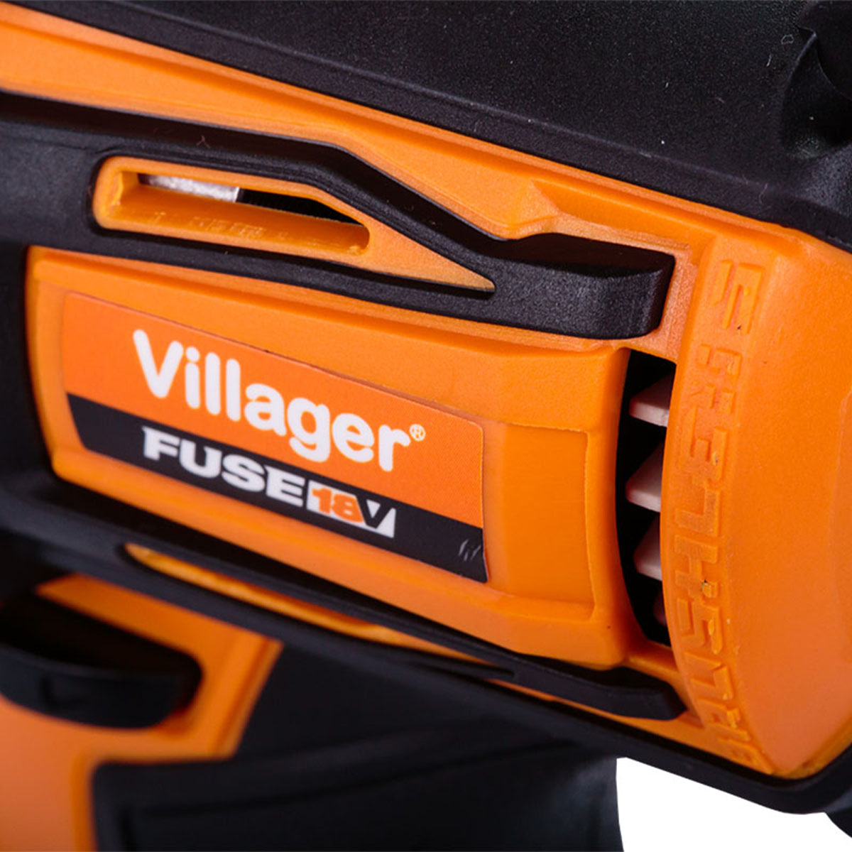 Pomarańczowe i czarne elektronarzędzie z etykietą "Villager FUSE 18V".