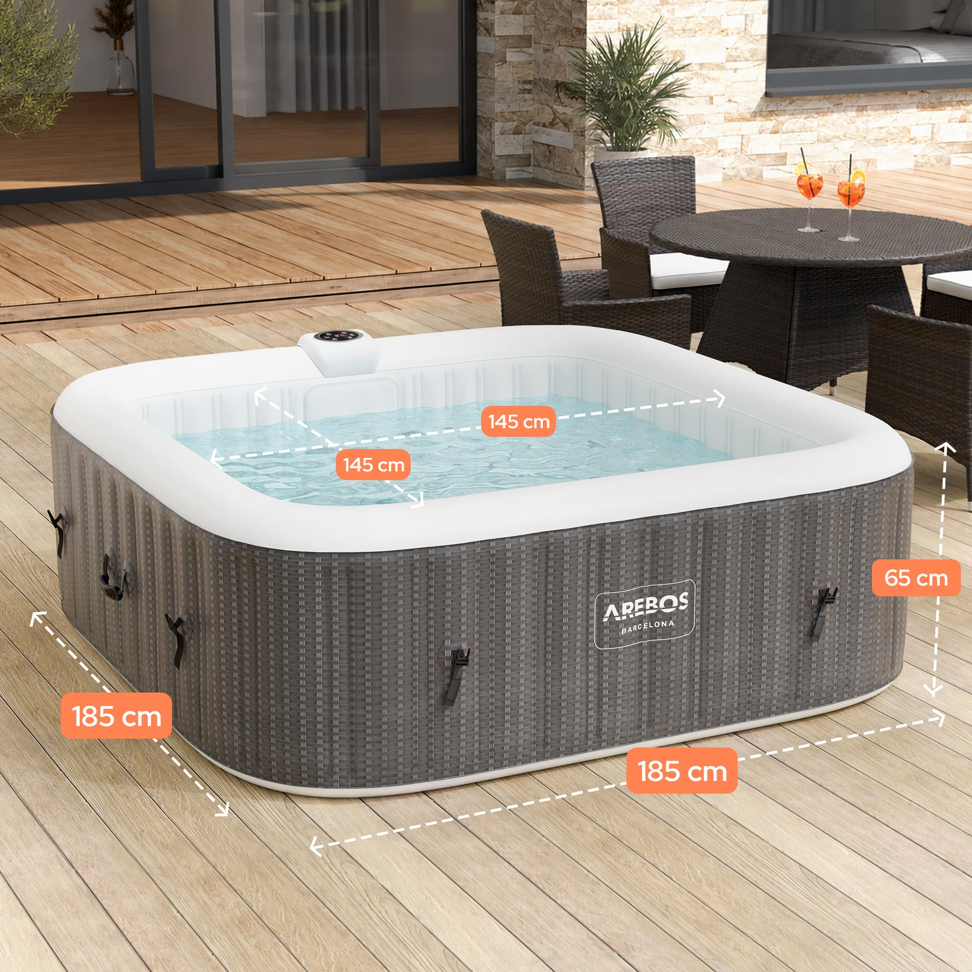 Aufblasbarer Whirlpool mit den Maßen 185x185x65cm auf einer Holzterrasse.
