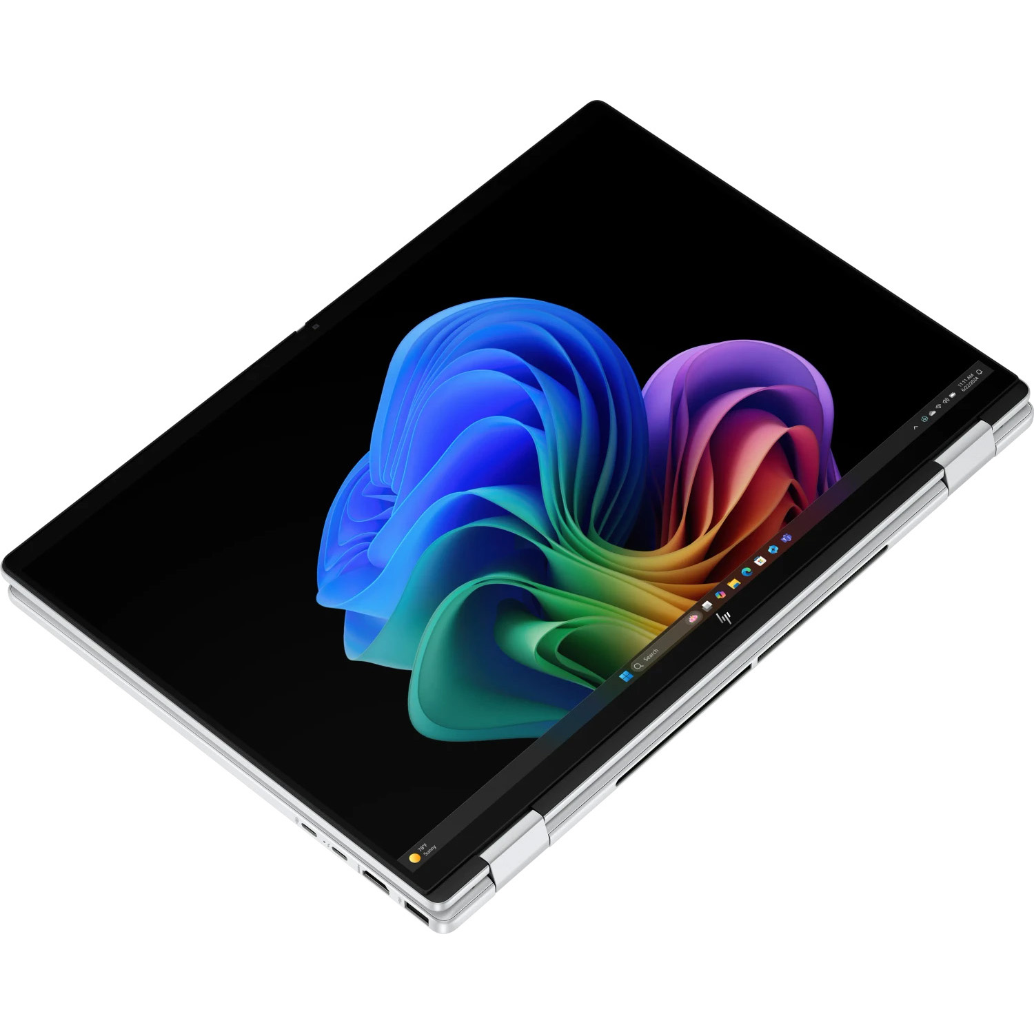Ein silberner Laptop mit einem bunten abstrakten Hintergrundbild auf dem Bildschirm.