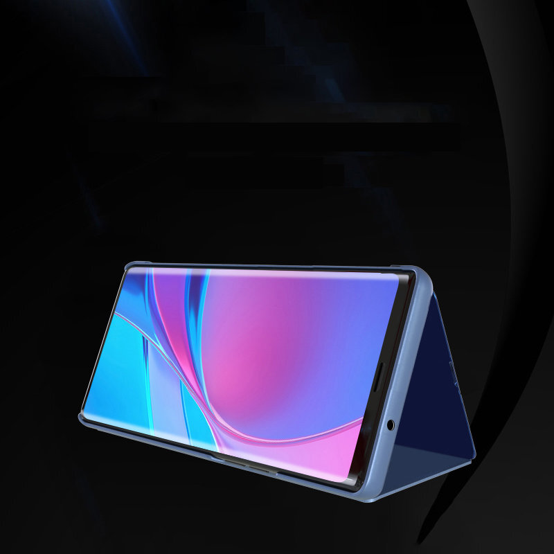 Ein blaues Handy mit einer Klapphülle steht aufrecht, mit einem bunten Hintergrund.