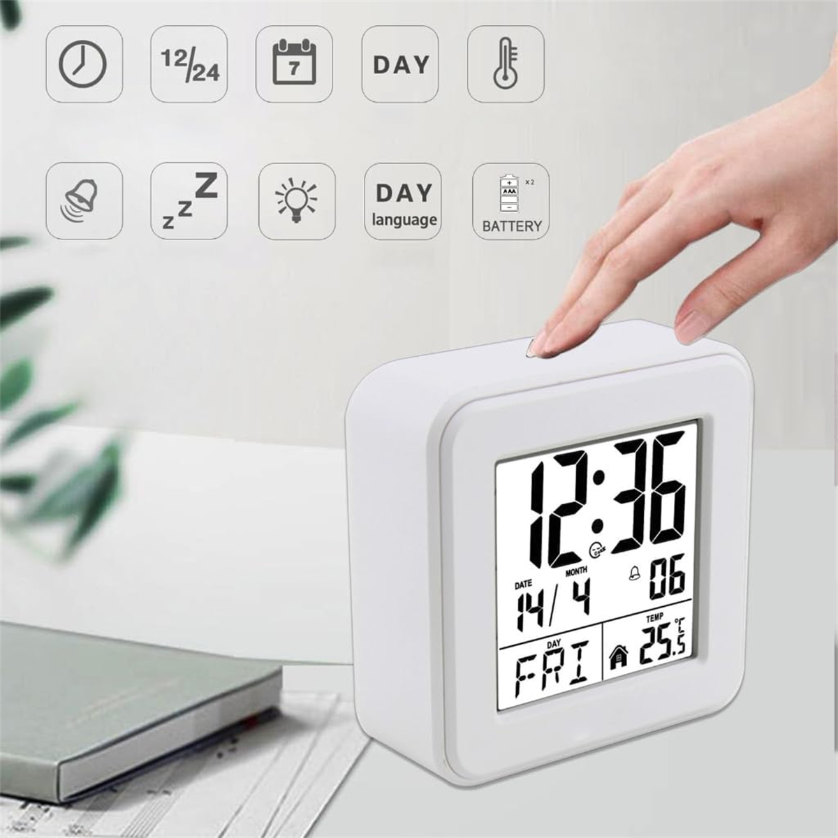 Eine weiße Digitaluhr zeigt 12:36, Freitag, 14. April und 25,5 Grad an.