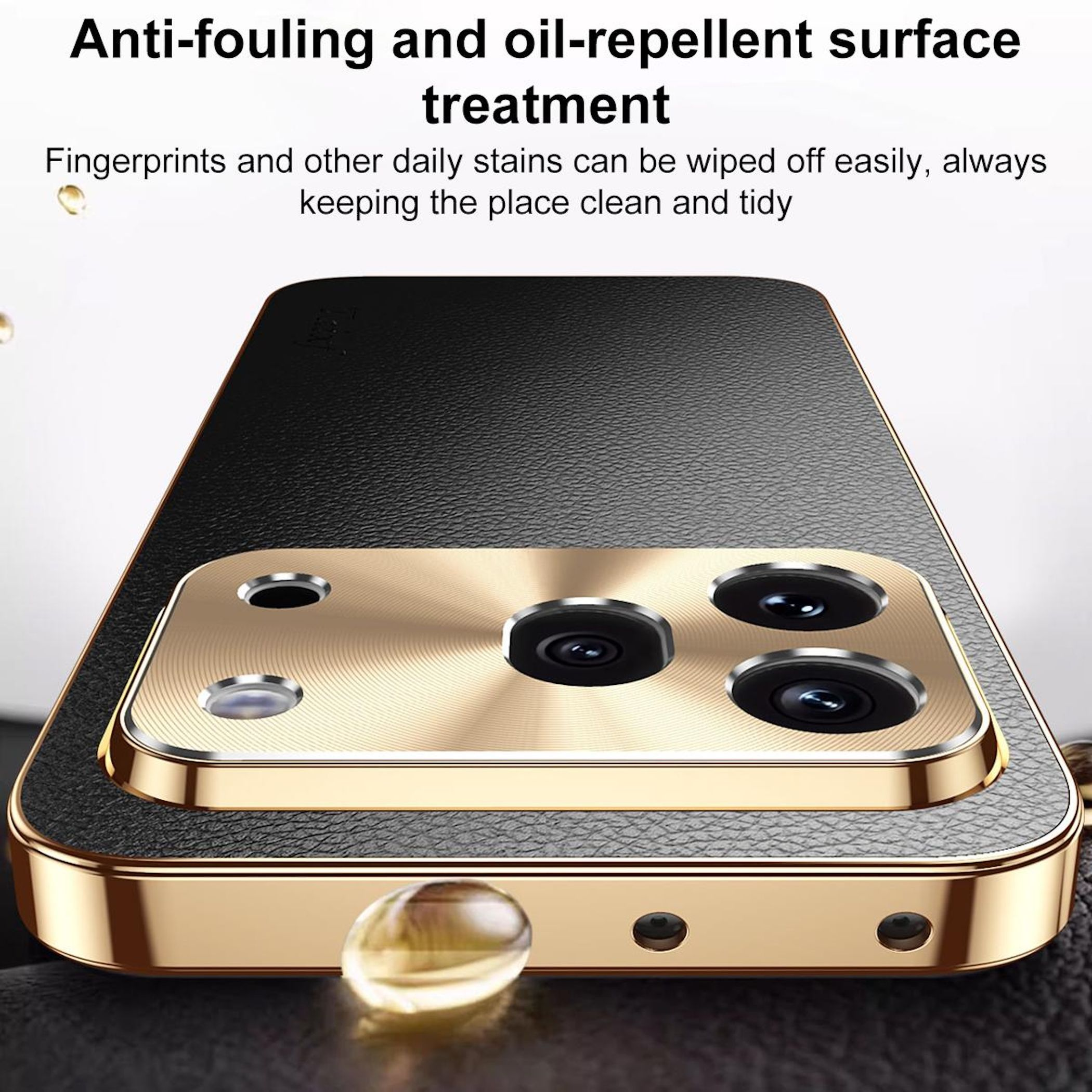 Schwarzes Handy mit goldenem Rahmen, Kameraobjektiven und Tropfen.