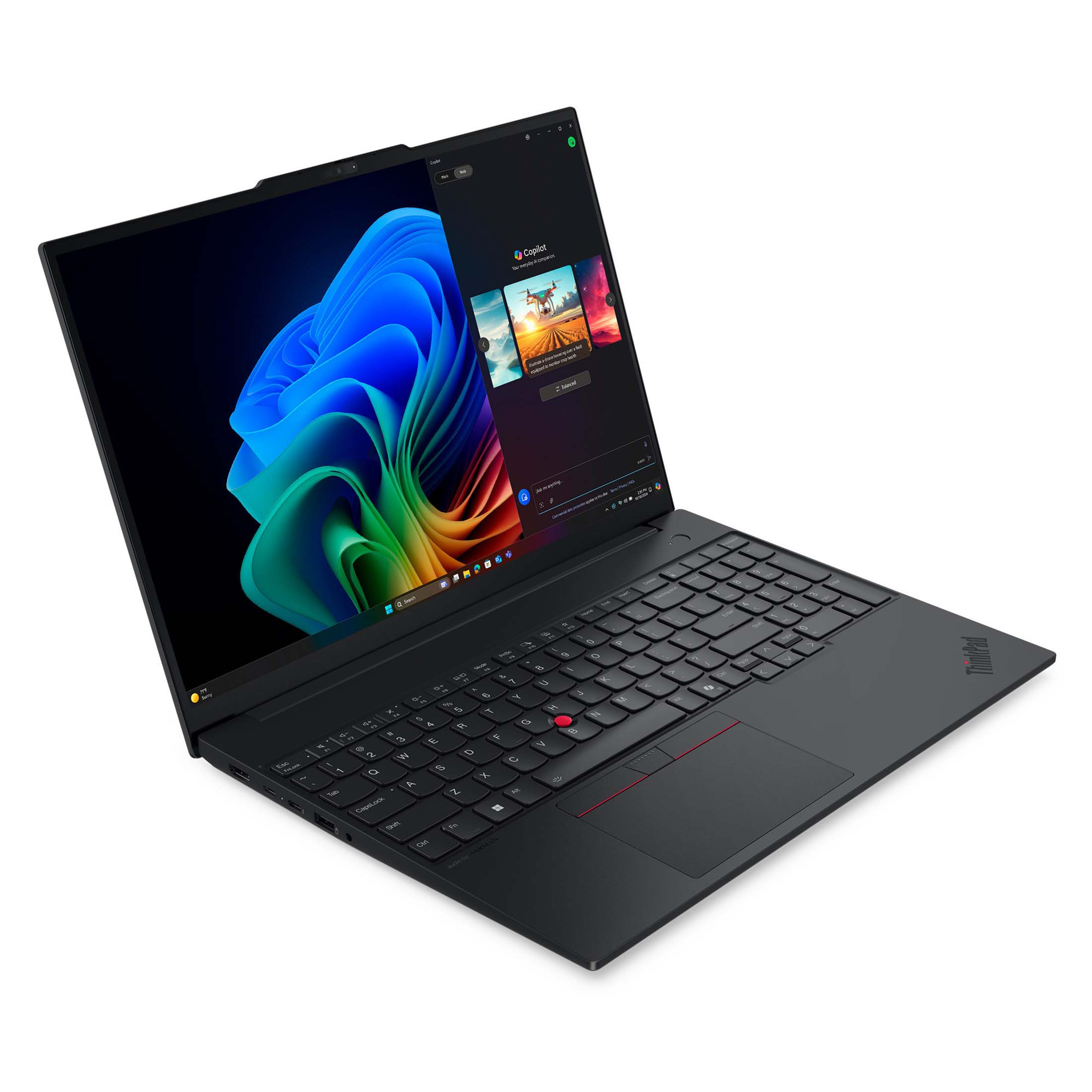 Schwarzer Laptop mit beleuchteter Tastatur und abstraktem Hintergrundbild auf dem Bildschirm.