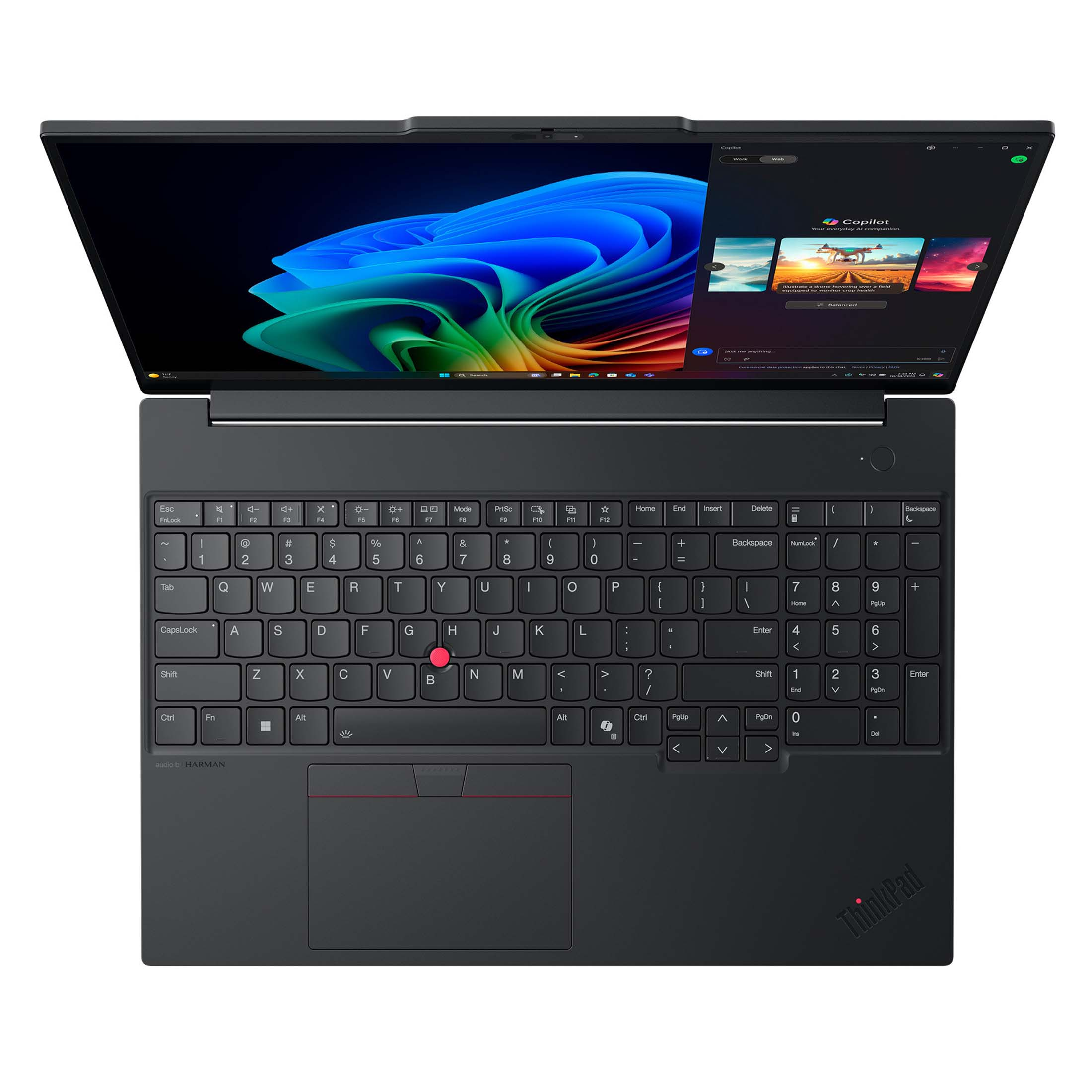 Ein geöffneter schwarzer Laptop mit einem blauen und grünen Hintergrundbild auf dem Bildschirm.