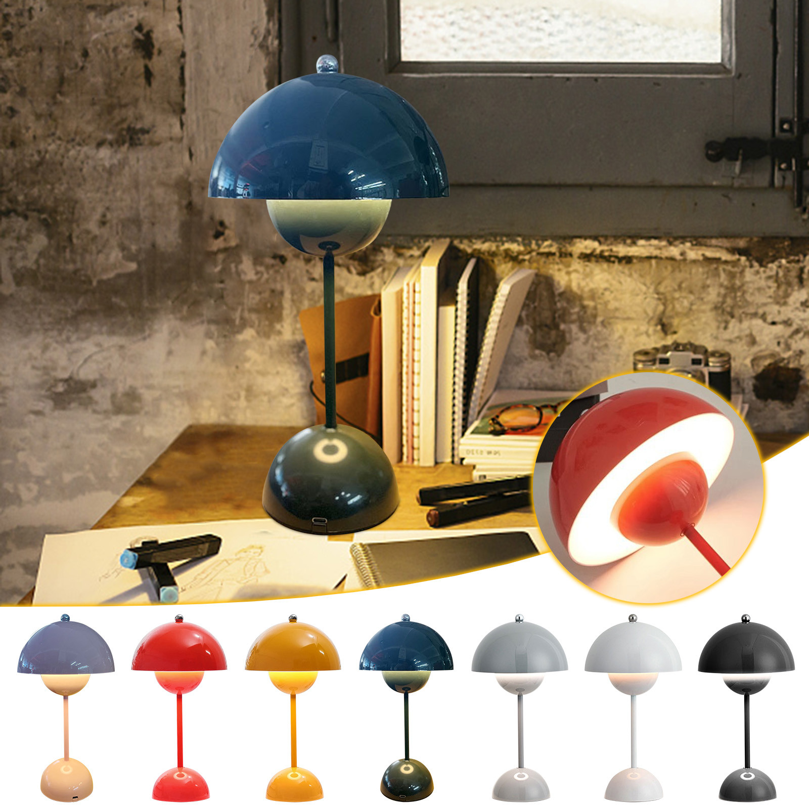 Eine blaue pilzförmige Schreibtischlampe steht auf einem Holztisch mit Büchern und Zeichenwerkzeugen.