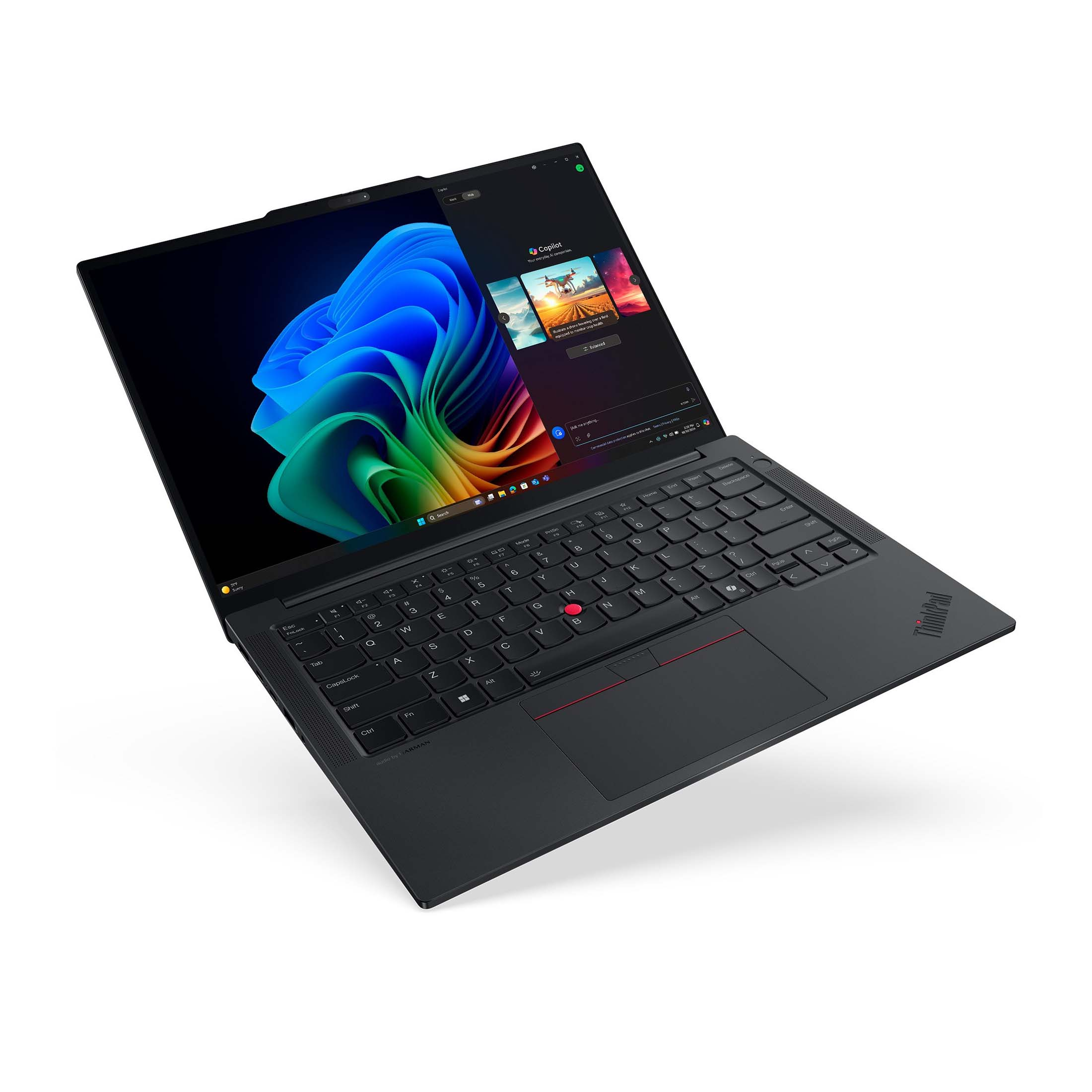 Schwarzer Laptop mit beleuchtetem Bildschirm, der ein farbenfrohes Muster anzeigt.