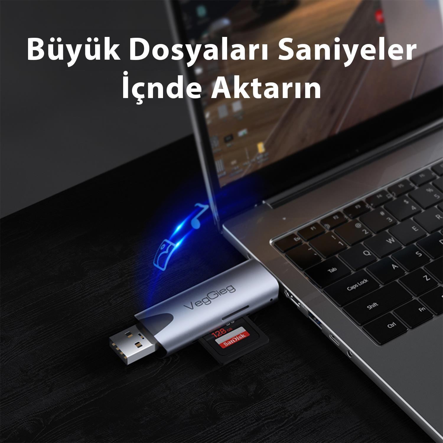 Bir USB bellek ve SD kart bir dizüstü bilgisayara bağlıdır.