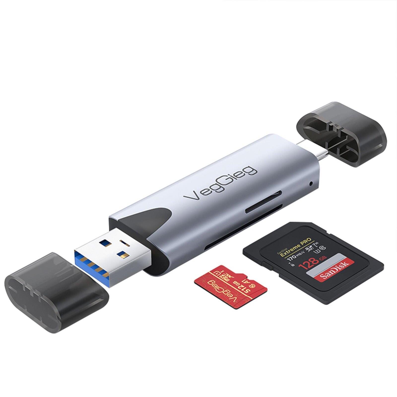 Gümüş renkli USB-C adaptör, USB-A fişli, yanında 128 GB ve 512 GB hafıza kartları bulunur.